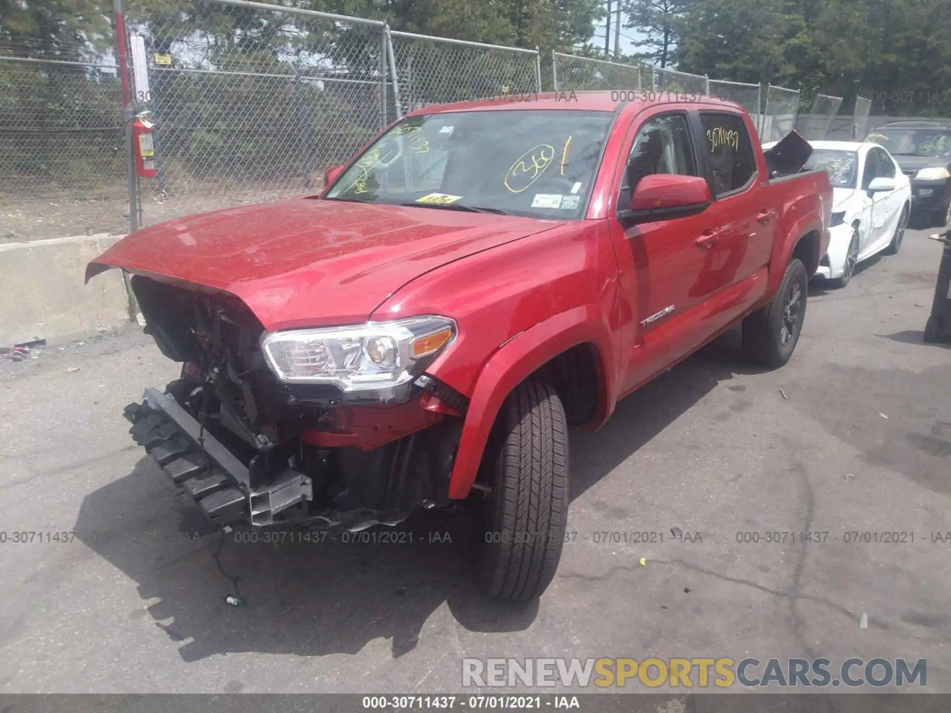 2 Photograph of a damaged car 5TFCZ5AN9MX271081 TOYOTA TACOMA 4WD 2021