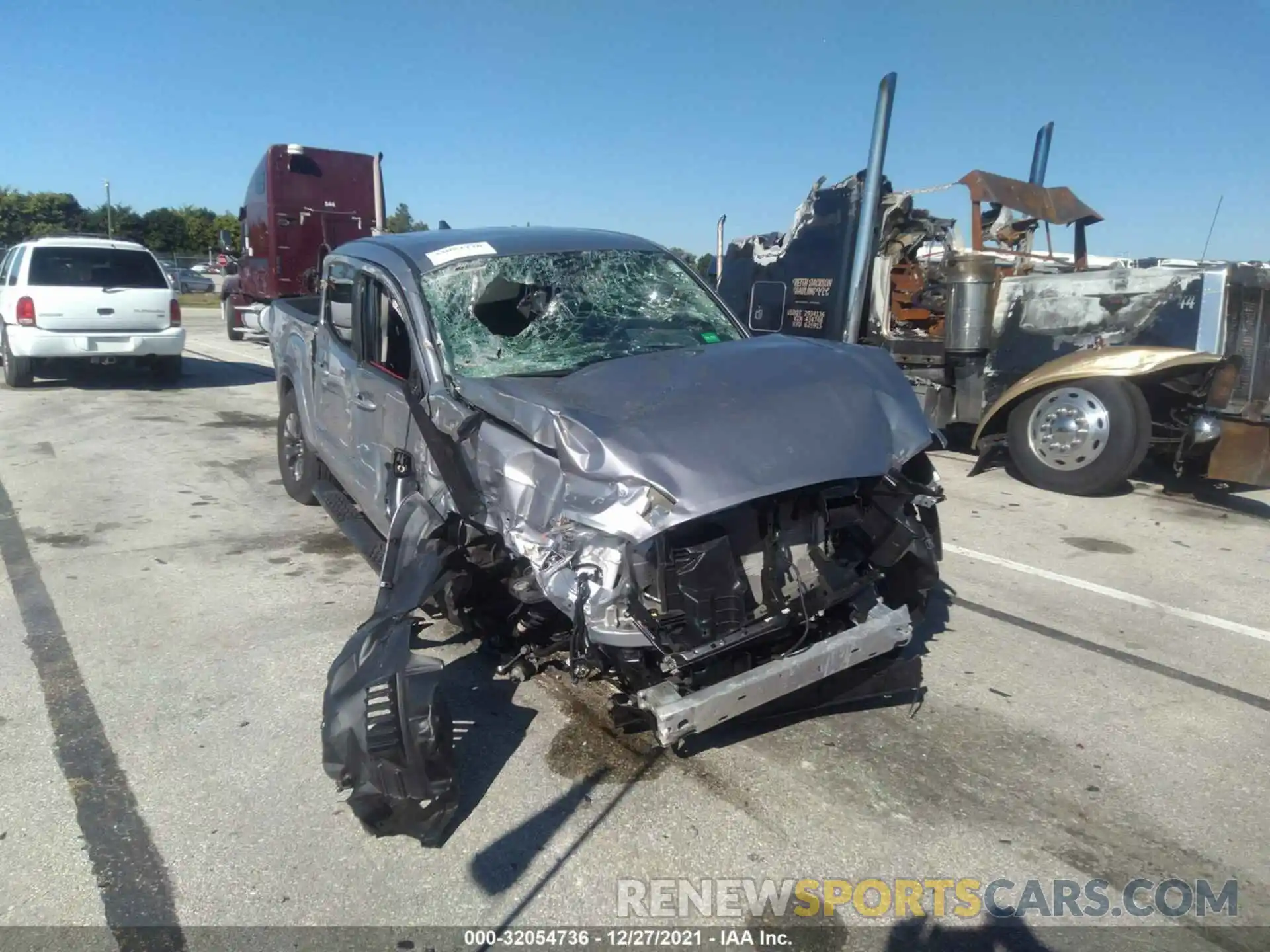 6 Photograph of a damaged car 5TFCZ5AN9MX277818 TOYOTA TACOMA 4WD 2021