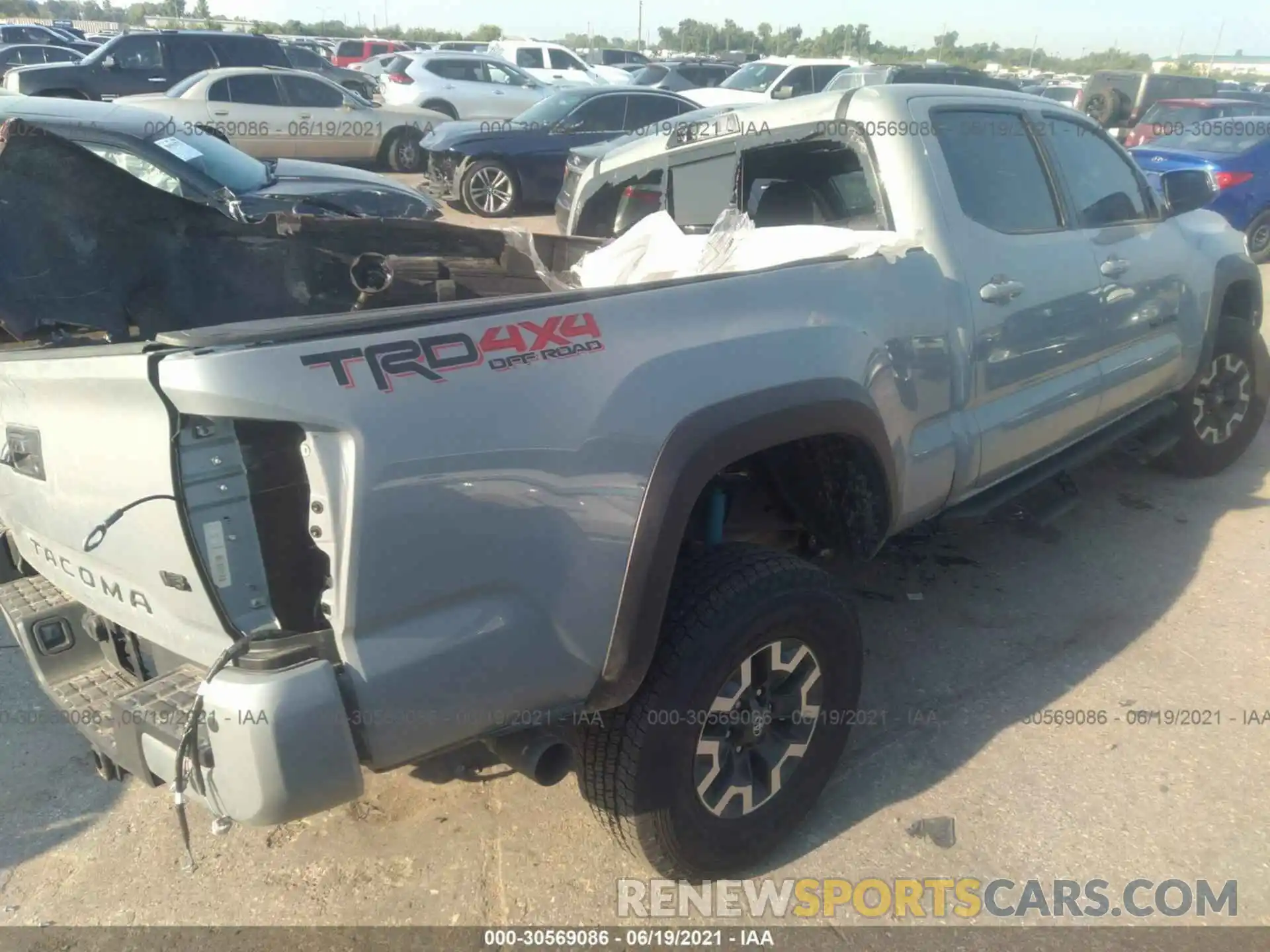 4 Photograph of a damaged car 5TFDZ5BN1MX061822 TOYOTA TACOMA 4WD 2021