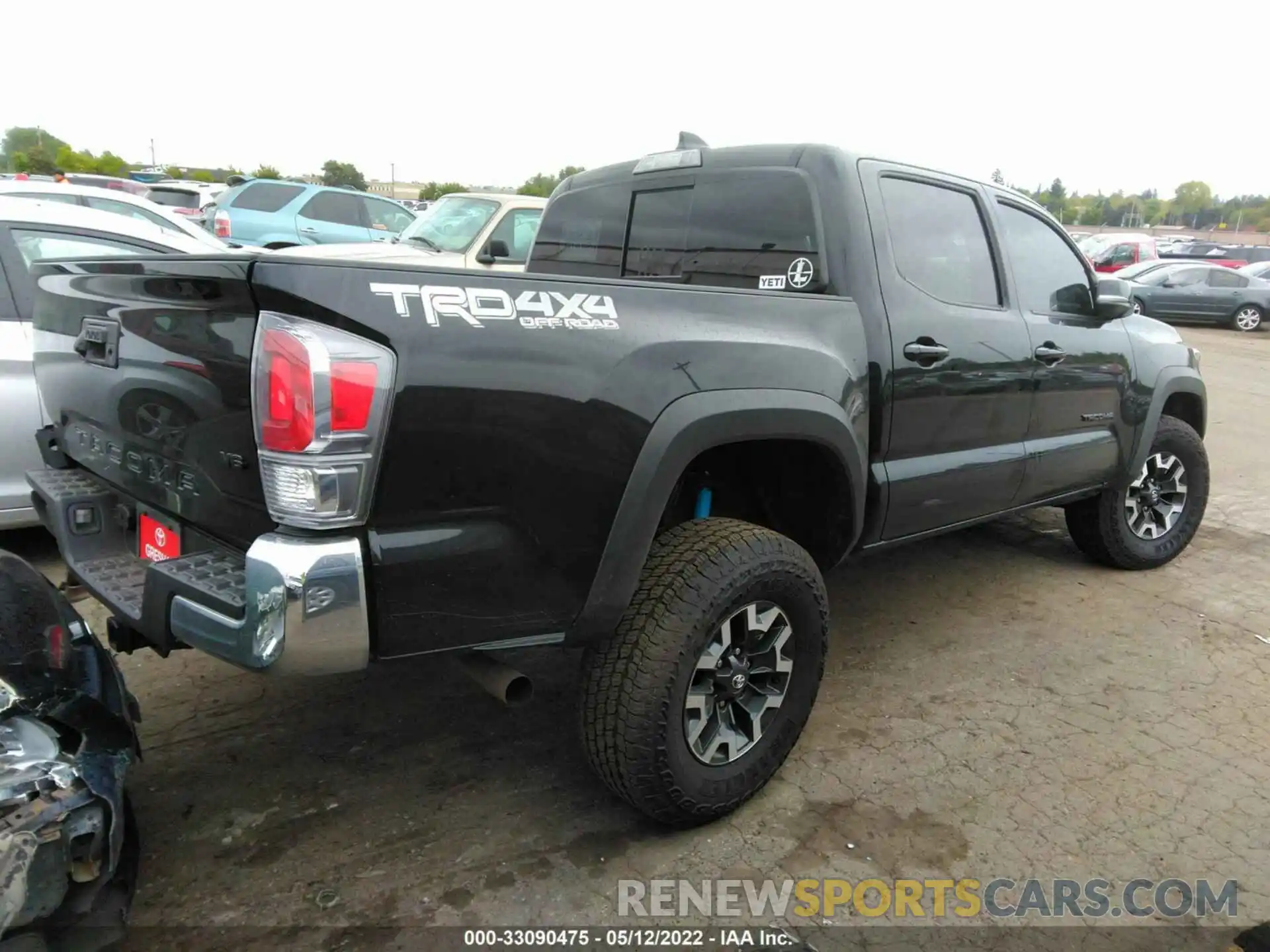 4 Photograph of a damaged car 3TMCZ5AN0NM490552 TOYOTA TACOMA 4WD 2022