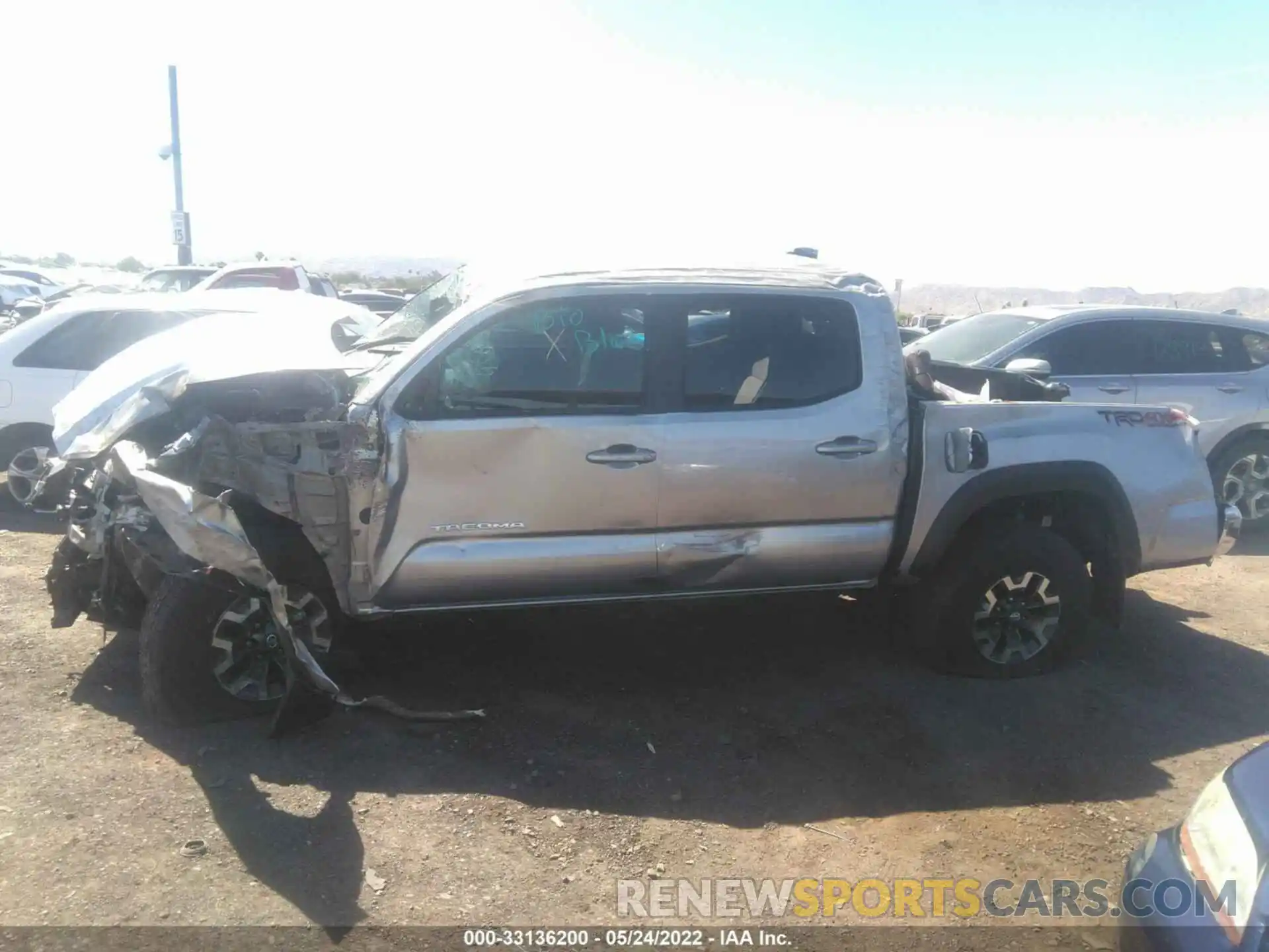 6 Photograph of a damaged car 3TMCZ5AN0NM498876 TOYOTA TACOMA 4WD 2022