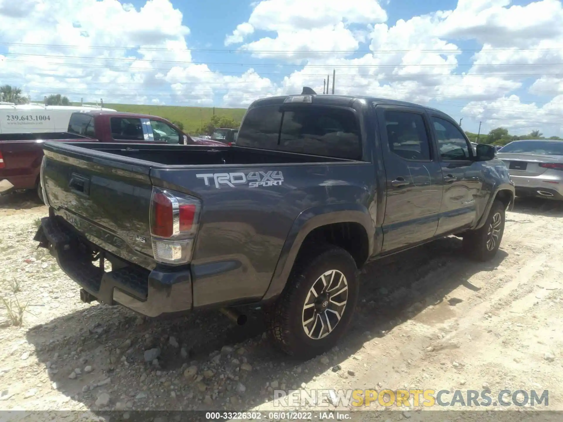 4 Photograph of a damaged car 3TMCZ5AN3NM477665 TOYOTA TACOMA 4WD 2022