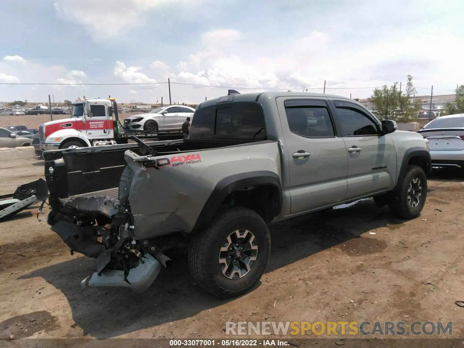 4 Photograph of a damaged car 3TMCZ5AN4NM455464 TOYOTA TACOMA 4WD 2022