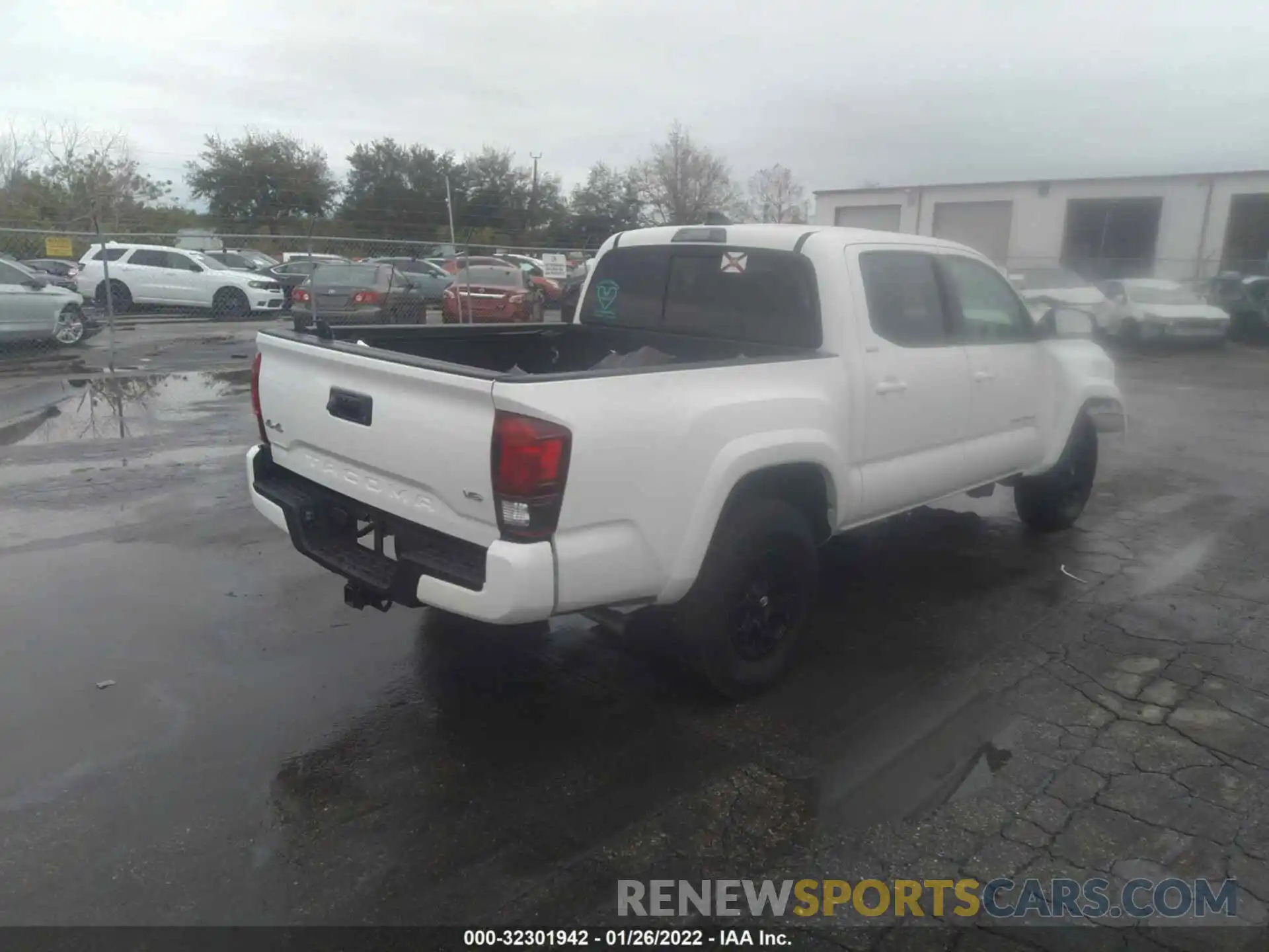 4 Photograph of a damaged car 3TMCZ5AN4NM463791 TOYOTA TACOMA 4WD 2022