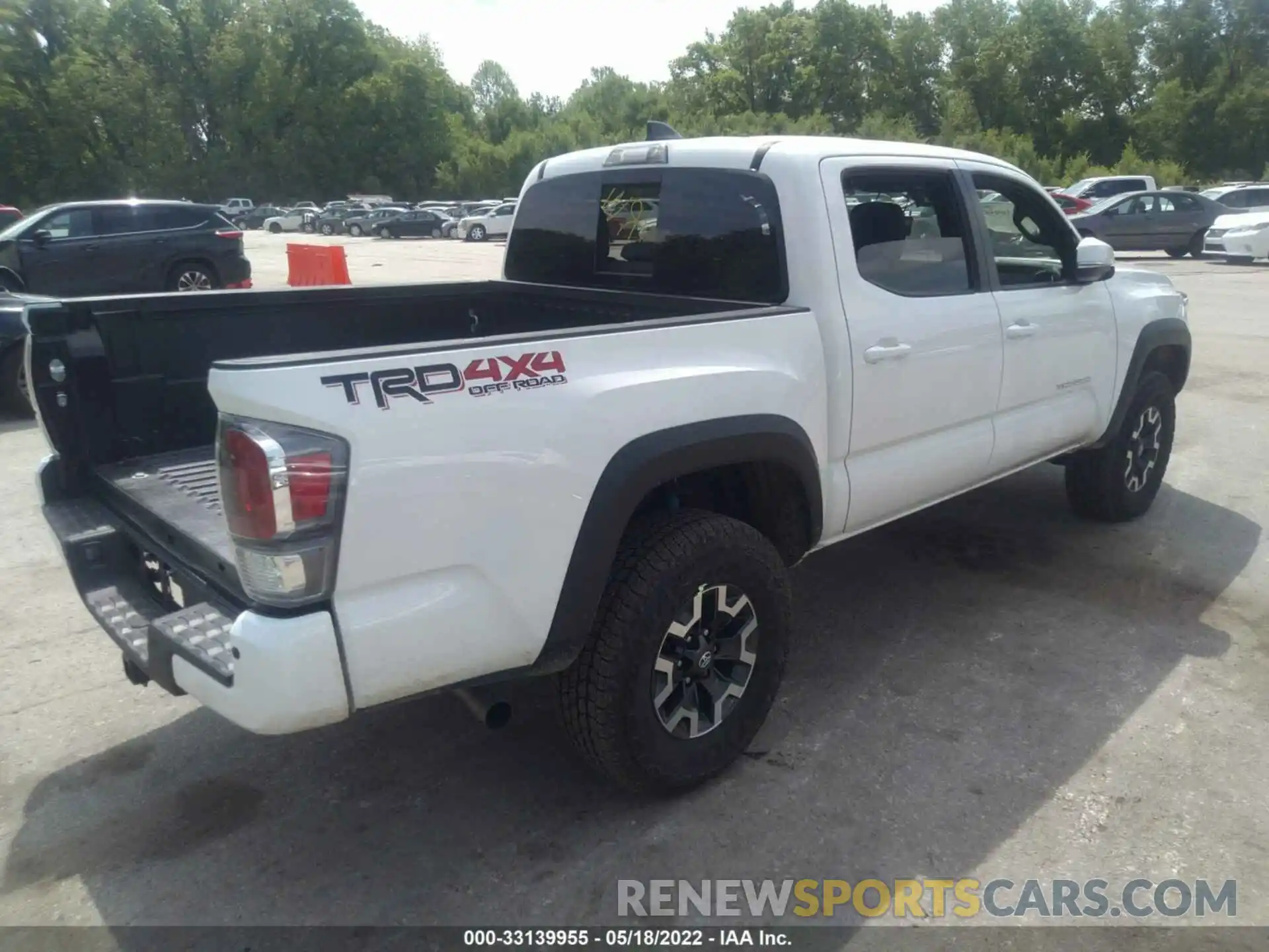 4 Photograph of a damaged car 3TMCZ5AN5NM487422 TOYOTA TACOMA 4WD 2022