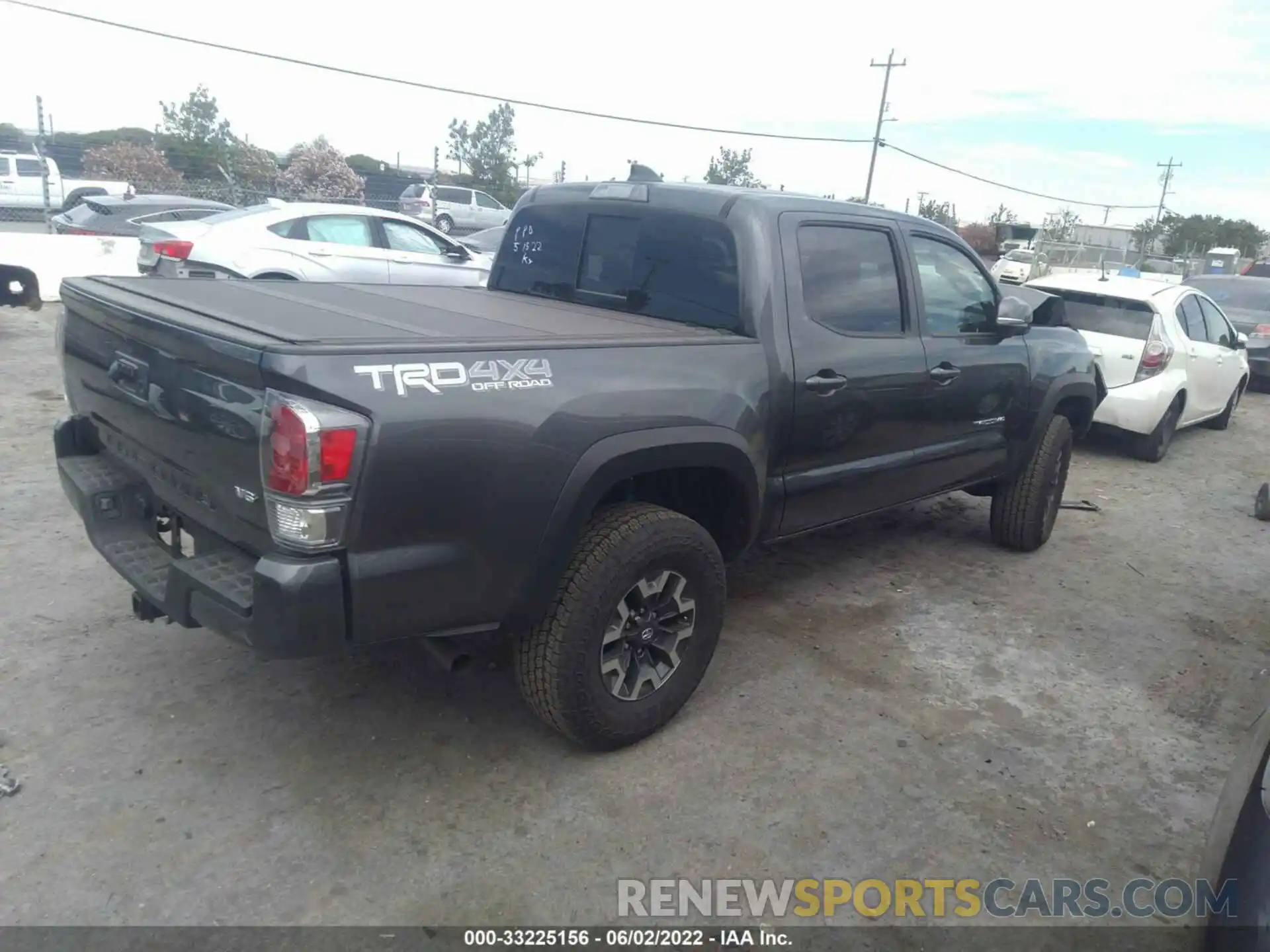 4 Photograph of a damaged car 3TMCZ5AN6NM457135 TOYOTA TACOMA 4WD 2022