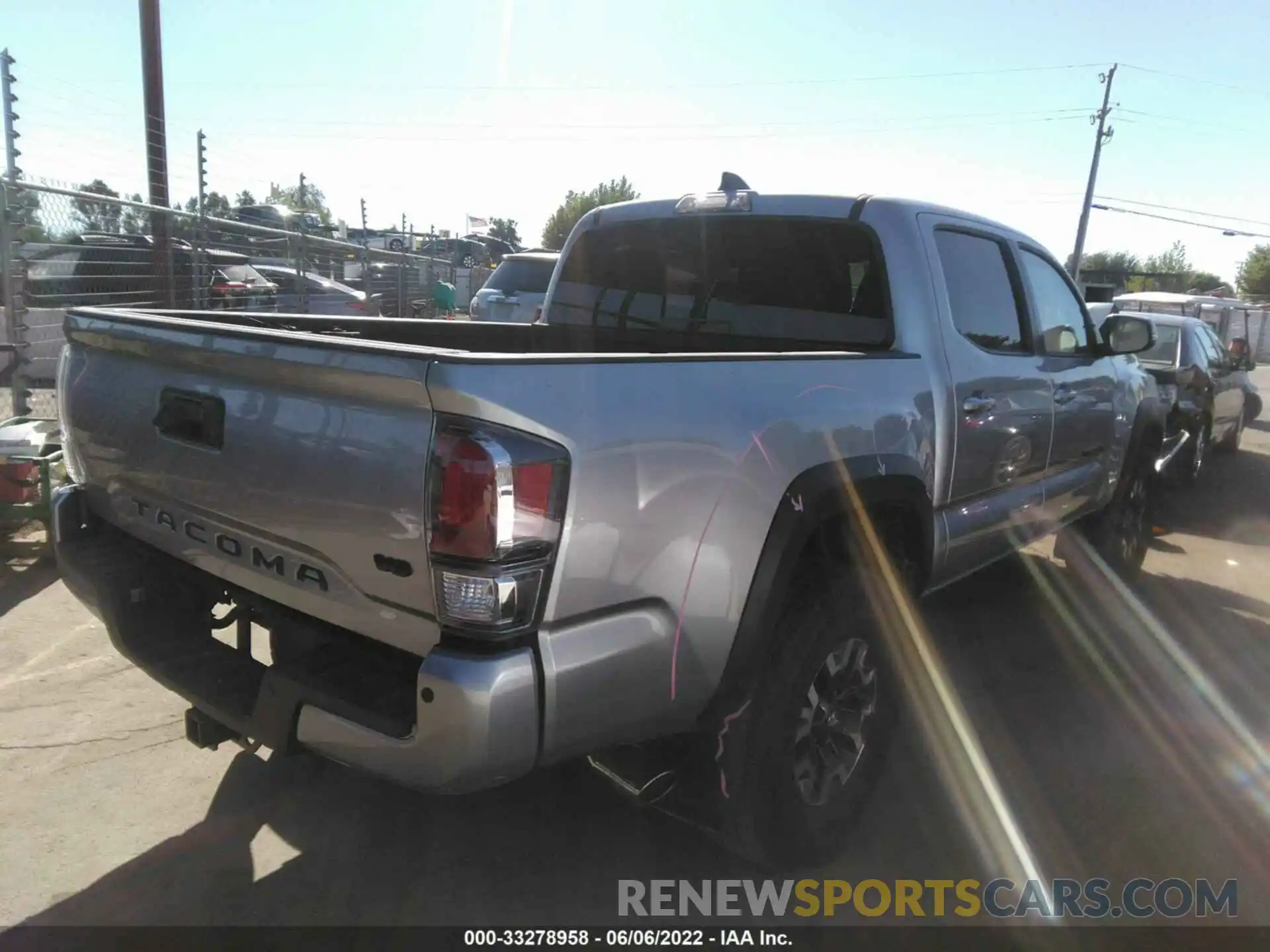 4 Photograph of a damaged car 3TMCZ5AN6NM494718 TOYOTA TACOMA 4WD 2022