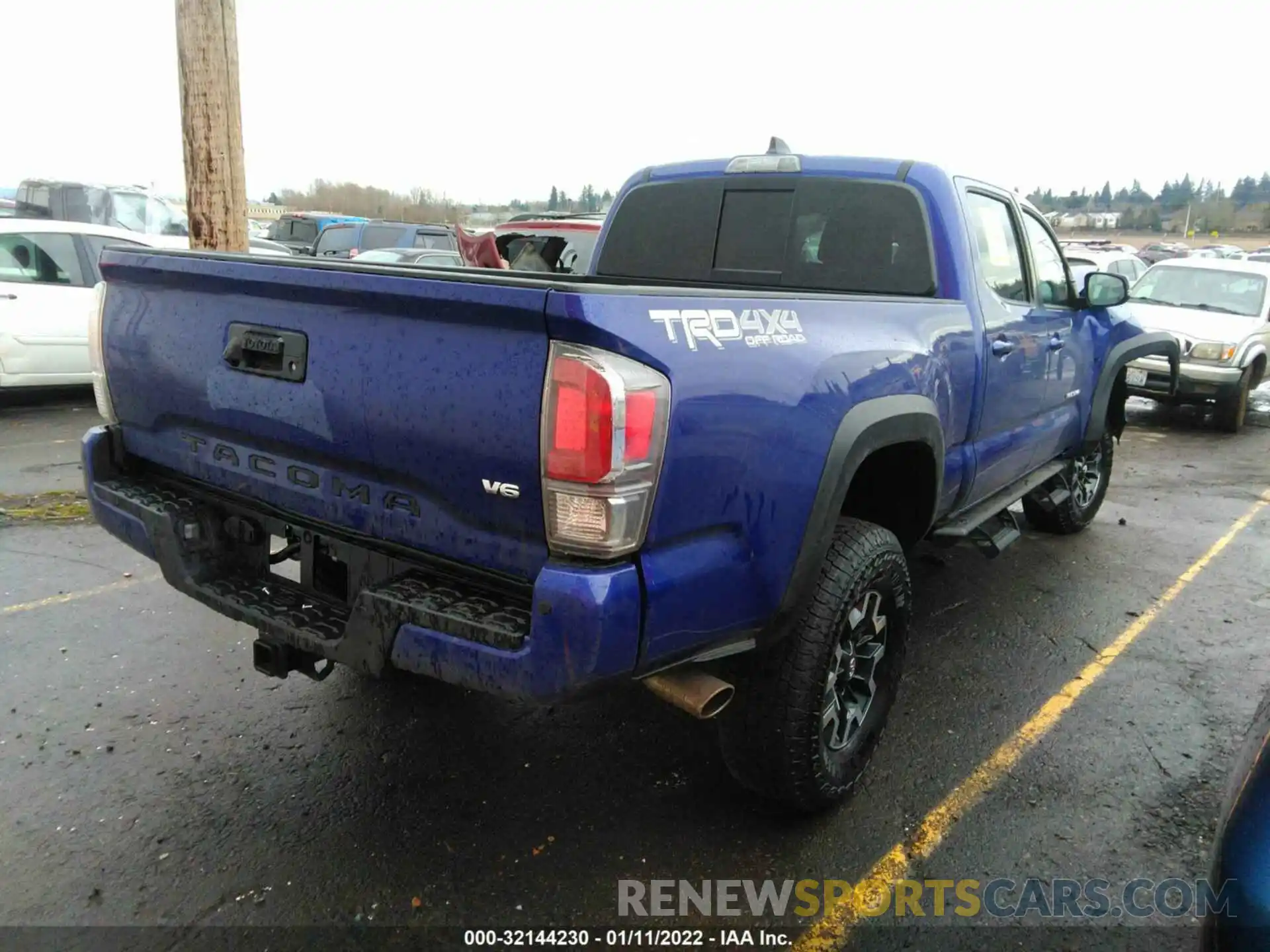 4 Photograph of a damaged car 3TMDZ5BN9NM122762 TOYOTA TACOMA 4WD 2022