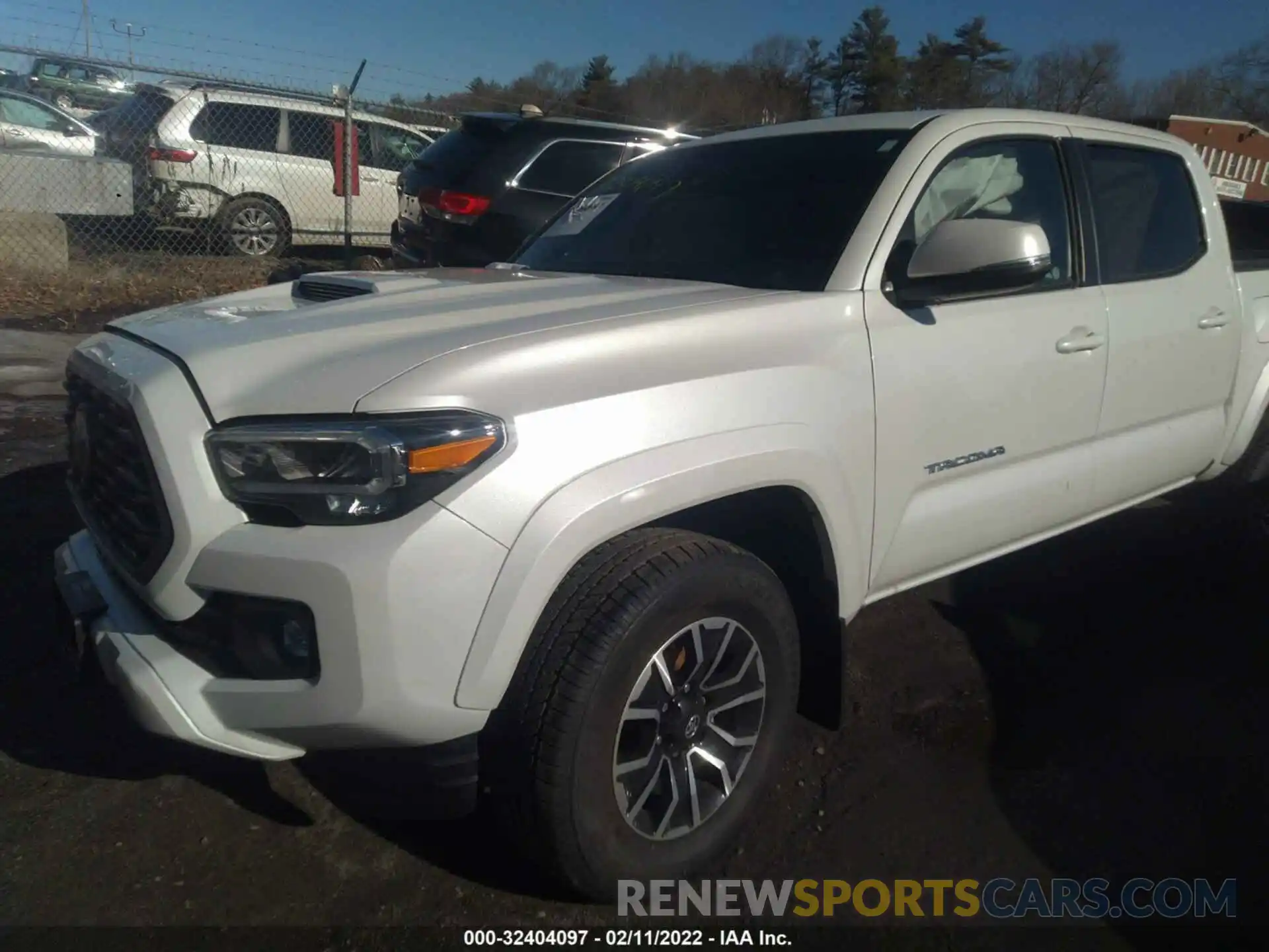 4 Photograph of a damaged car 3TYCZ5AN2NT060378 TOYOTA TACOMA 4WD 2022