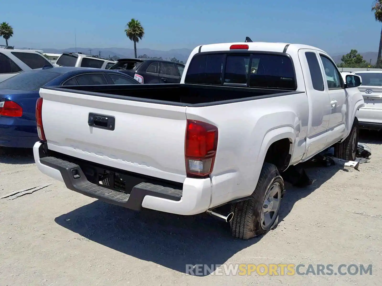 4 Photograph of a damaged car 5TFRX5GN5KX149984 TOYOTA TACOMA ACC 2019