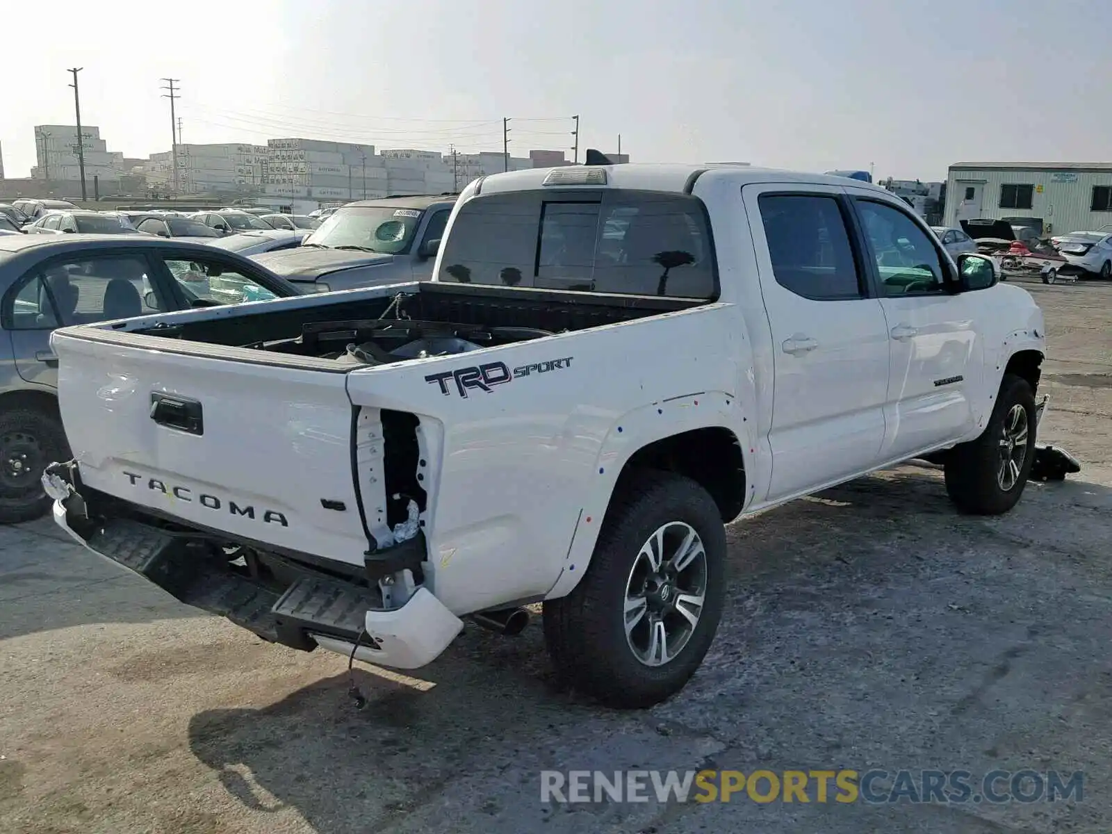 4 Photograph of a damaged car 3TMAZ5CN0KM090202 TOYOTA TACOMA DOU 2019