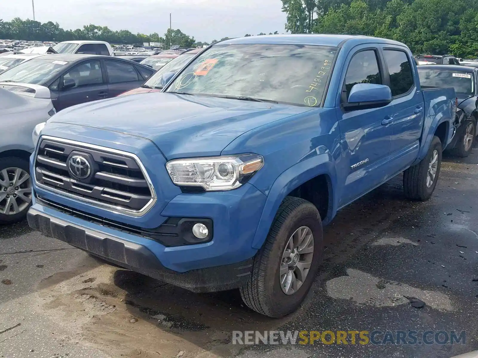 2 Photograph of a damaged car 3TMAZ5CN0KM095710 TOYOTA TACOMA DOU 2019