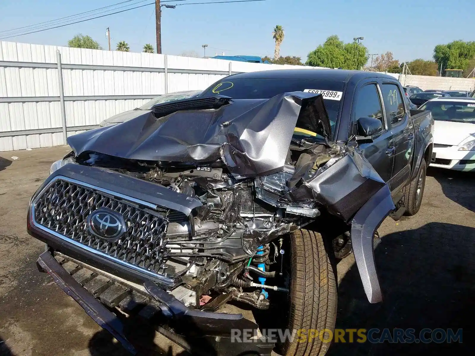 2 Photograph of a damaged car 3TMAZ5CN0KM107242 TOYOTA TACOMA DOU 2019