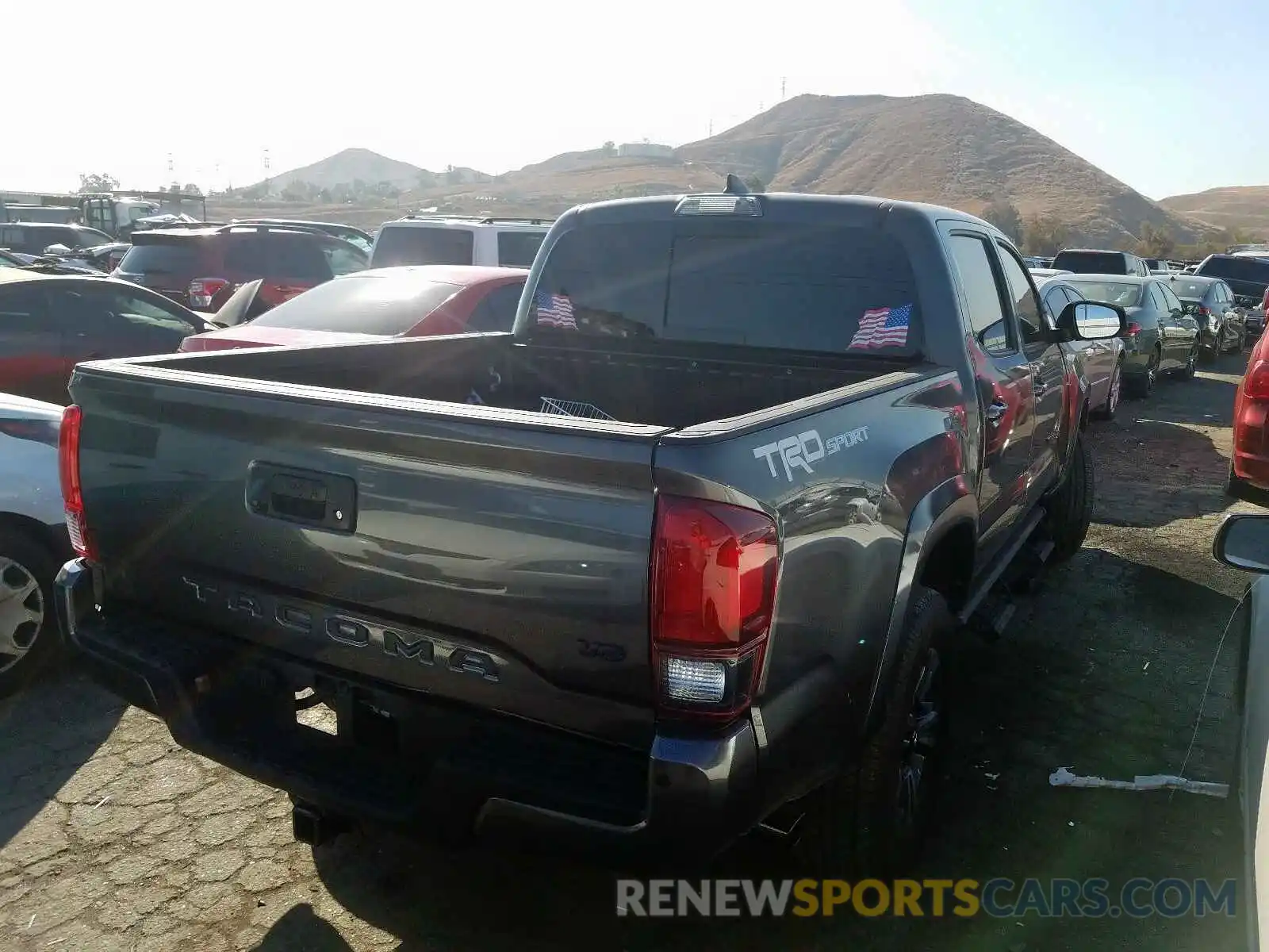 4 Photograph of a damaged car 3TMAZ5CN0KM107242 TOYOTA TACOMA DOU 2019