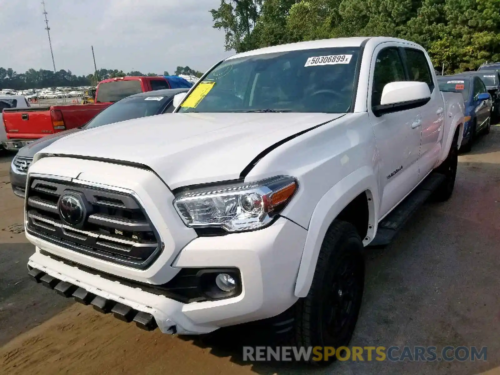 2 Photograph of a damaged car 3TMAZ5CN0KM111601 TOYOTA TACOMA DOU 2019