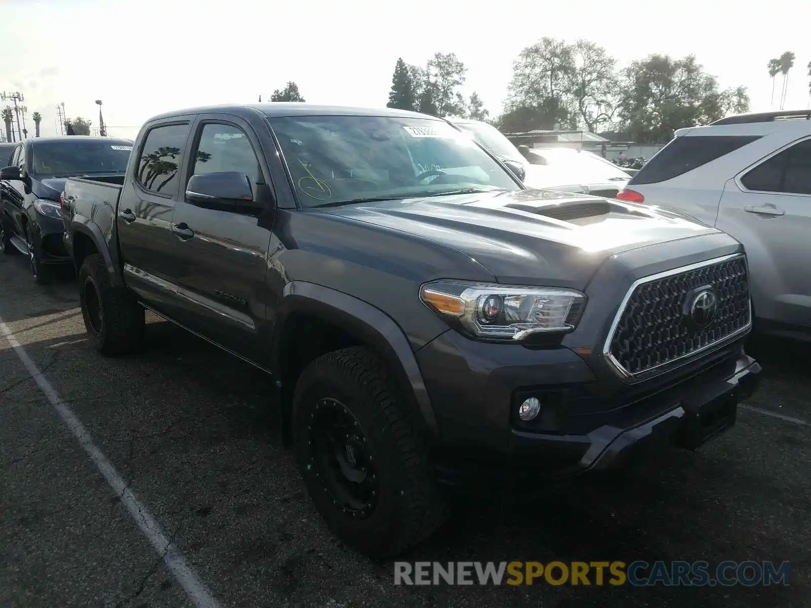 1 Photograph of a damaged car 3TMAZ5CN1KM089673 TOYOTA TACOMA DOU 2019