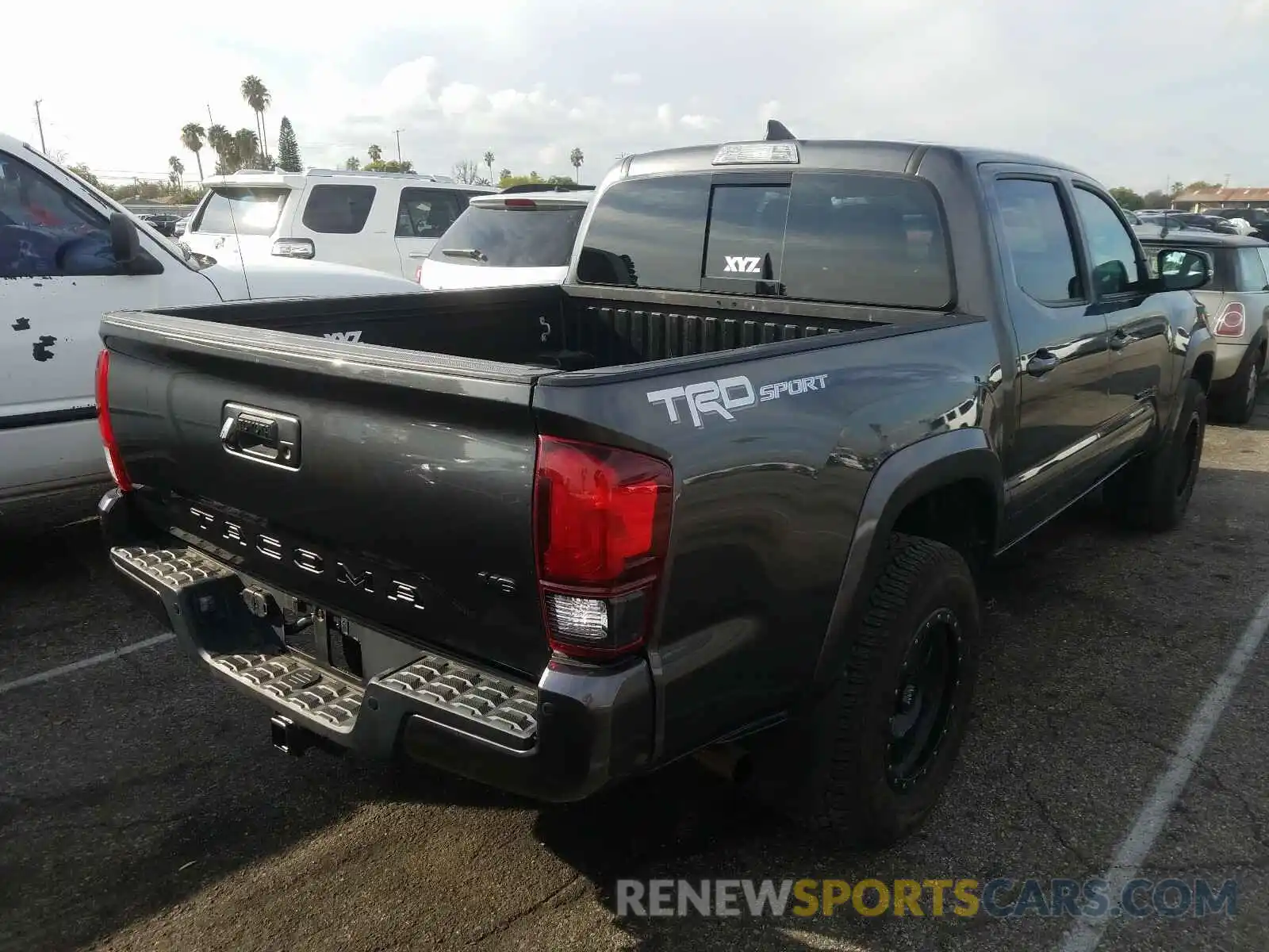 4 Photograph of a damaged car 3TMAZ5CN1KM089673 TOYOTA TACOMA DOU 2019