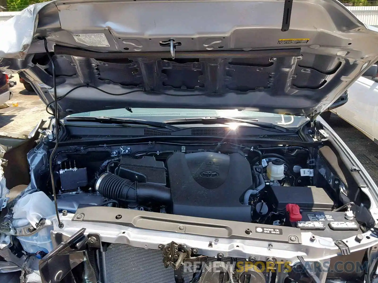 7 Photograph of a damaged car 3TMAZ5CN1KM094825 TOYOTA TACOMA DOU 2019