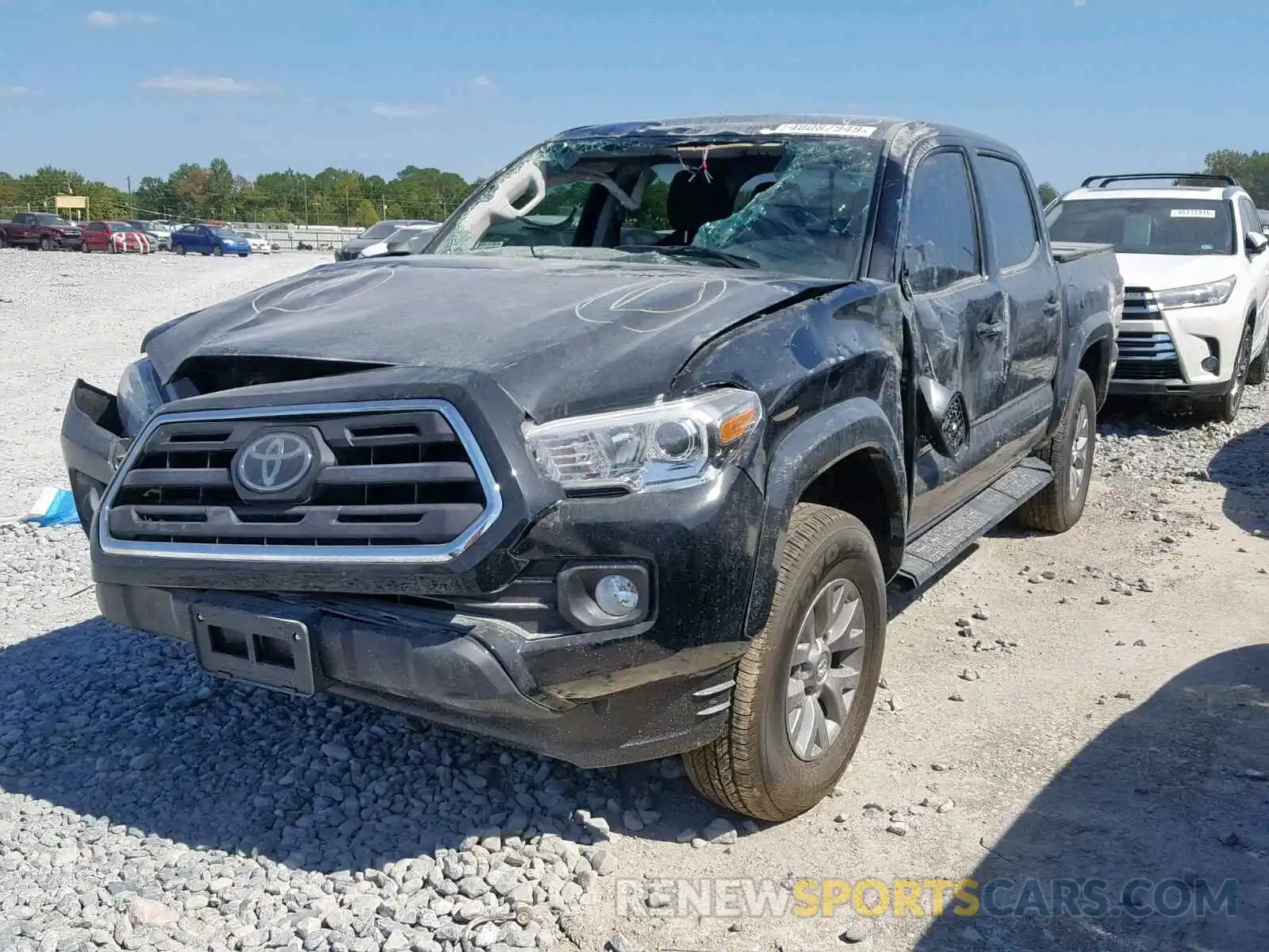 2 Photograph of a damaged car 3TMAZ5CN1KM100901 TOYOTA TACOMA DOU 2019