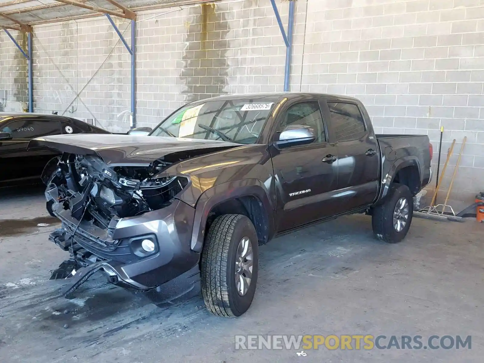 2 Photograph of a damaged car 3TMAZ5CN2KM083347 TOYOTA TACOMA DOU 2019