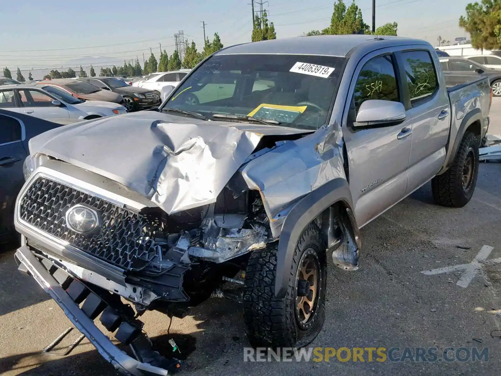 2 Photograph of a damaged car 3TMAZ5CN2KM089987 TOYOTA TACOMA DOU 2019