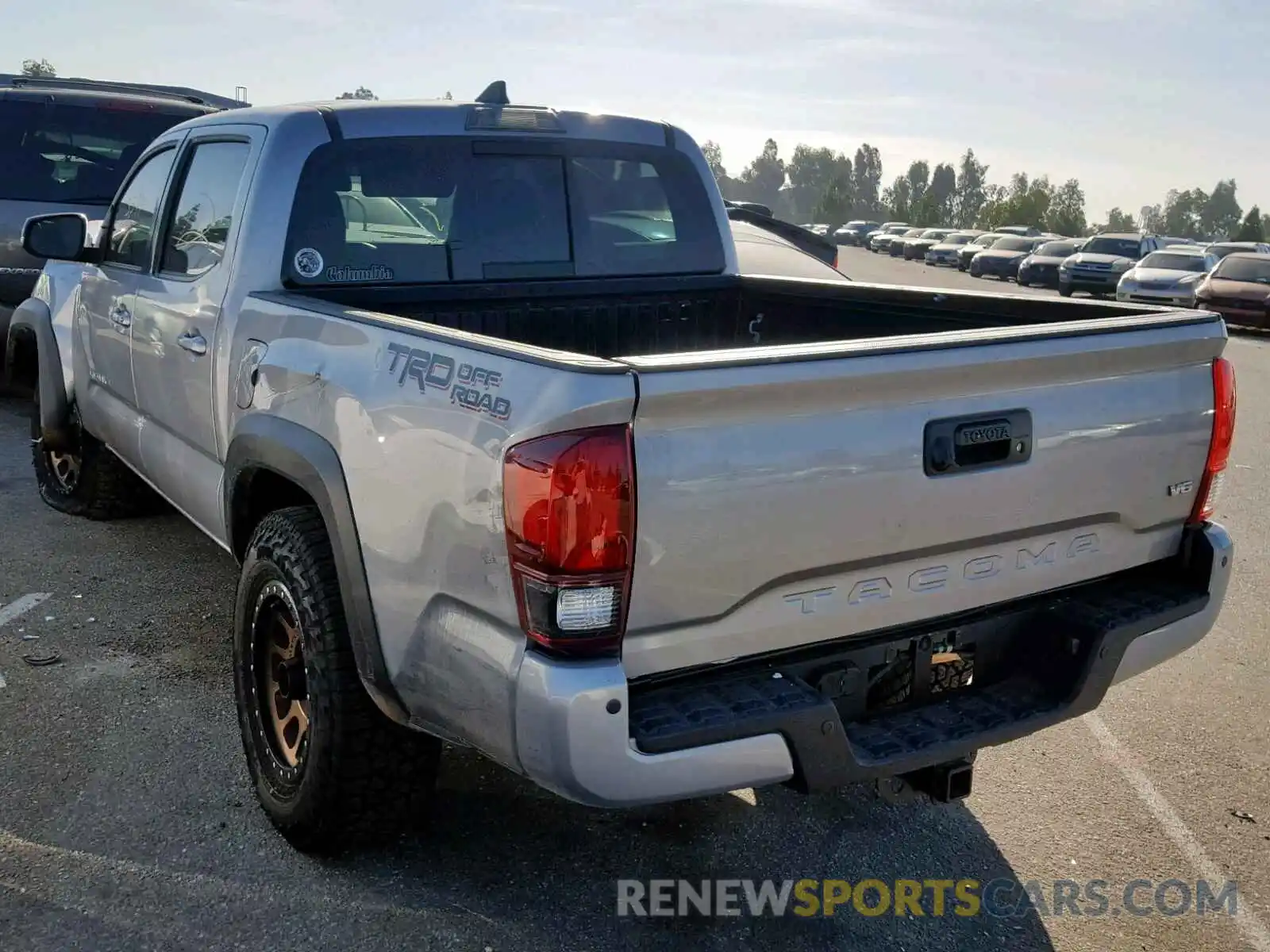 3 Photograph of a damaged car 3TMAZ5CN2KM089987 TOYOTA TACOMA DOU 2019