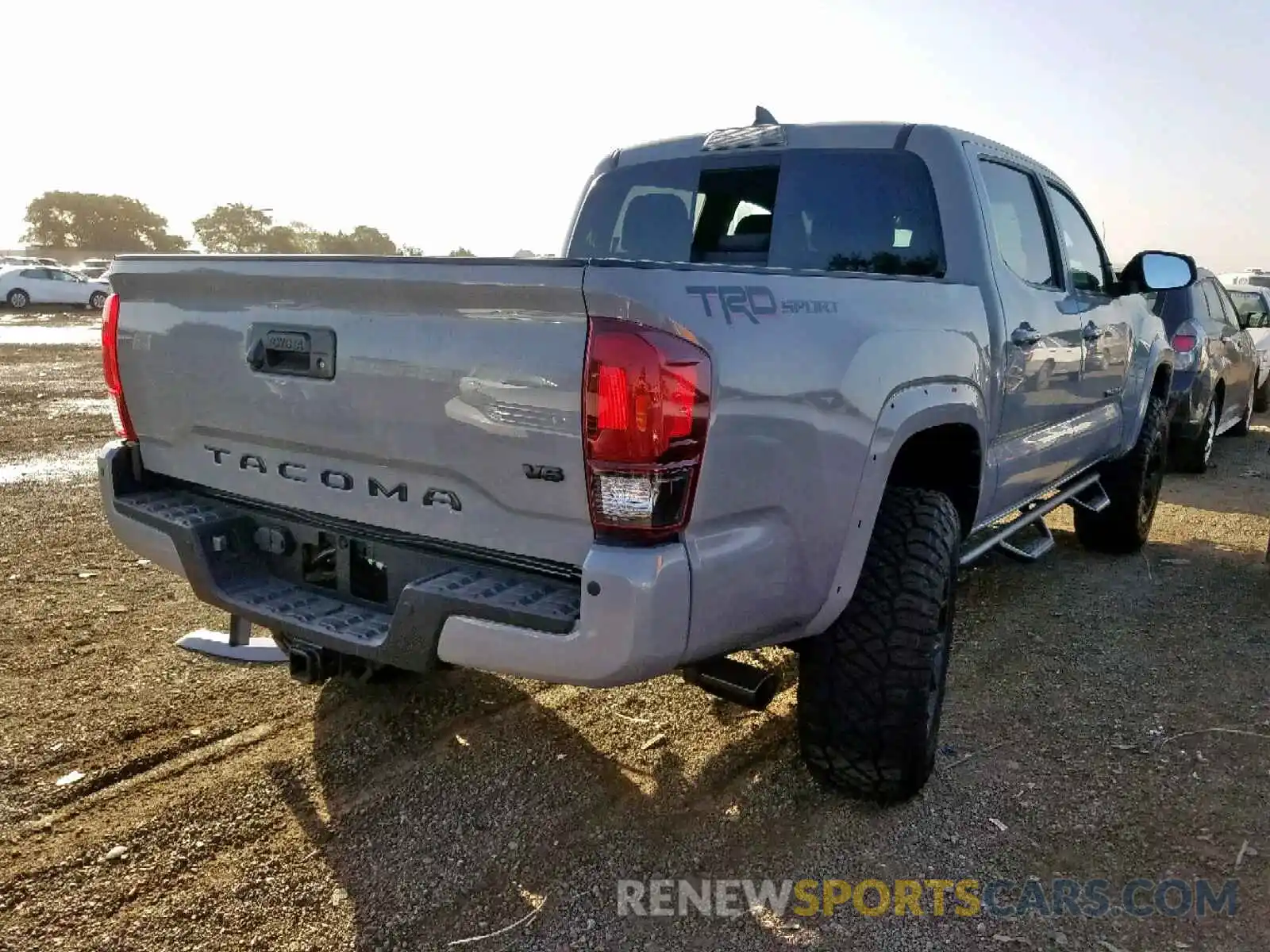 4 Photograph of a damaged car 3TMAZ5CN2KM092615 TOYOTA TACOMA DOU 2019