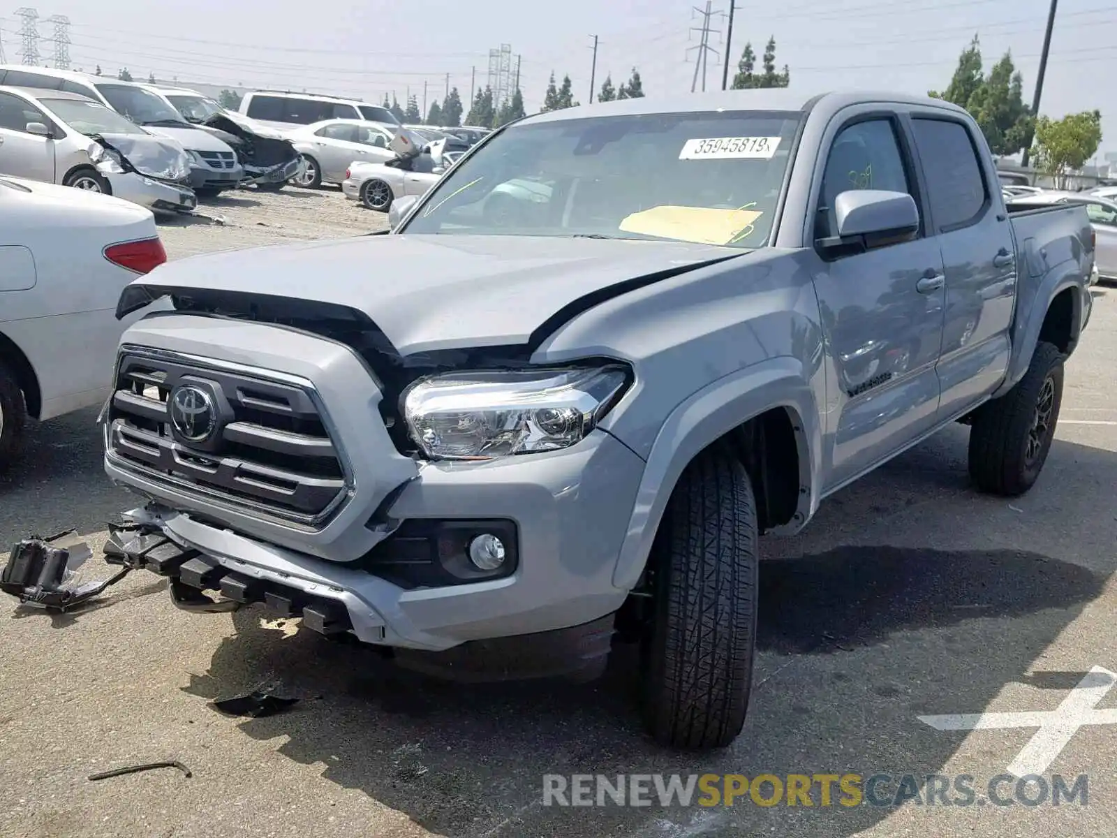 2 Photograph of a damaged car 3TMAZ5CN2KM099239 TOYOTA TACOMA DOU 2019