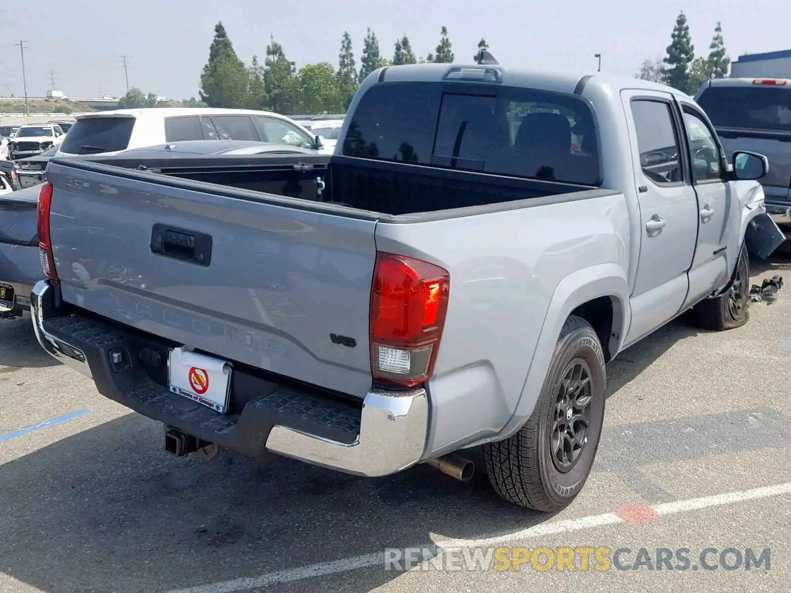 4 Photograph of a damaged car 3TMAZ5CN2KM099239 TOYOTA TACOMA DOU 2019