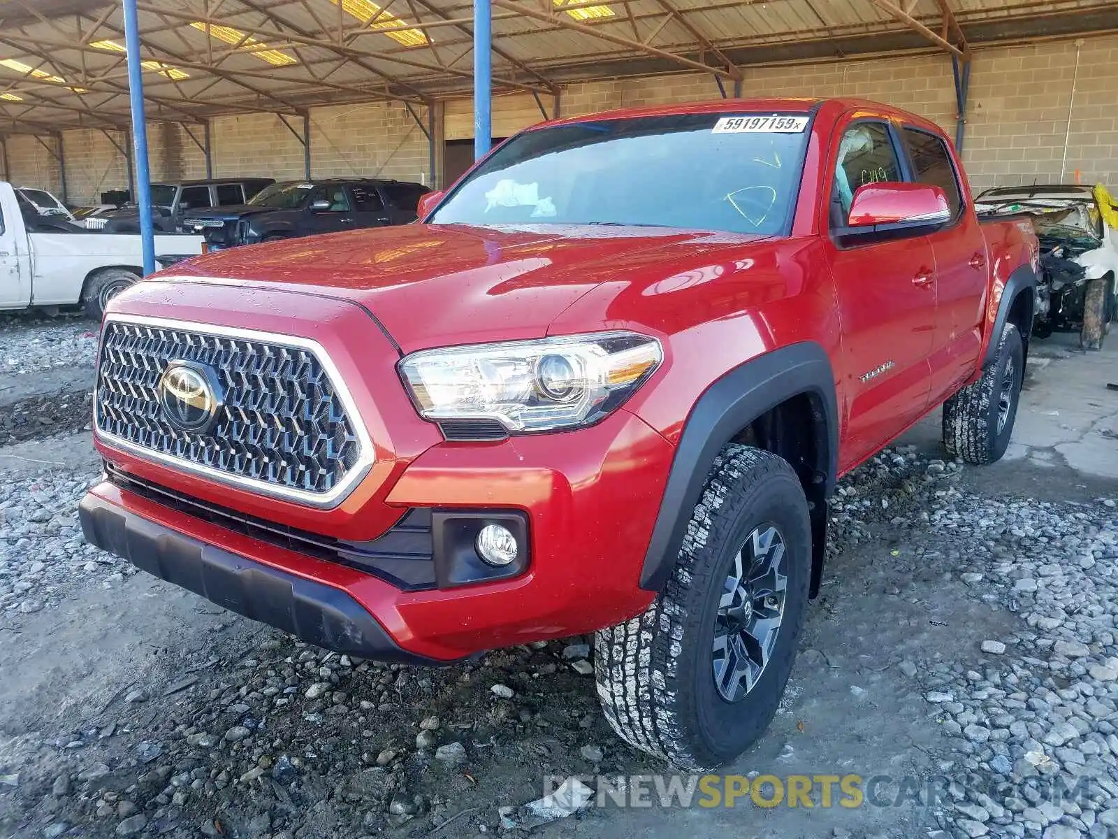 2 Photograph of a damaged car 3TMAZ5CN3KM079792 TOYOTA TACOMA DOU 2019