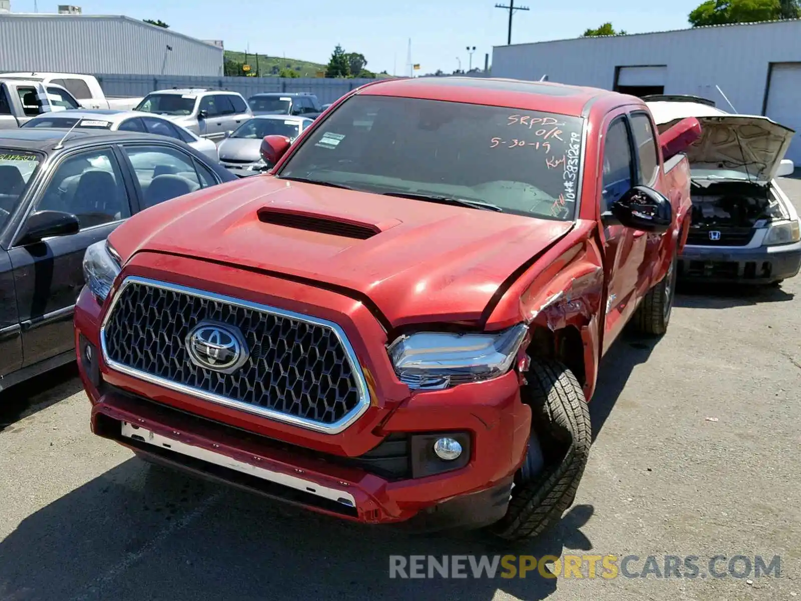 2 Photograph of a damaged car 3TMAZ5CN3KM080215 TOYOTA TACOMA DOU 2019