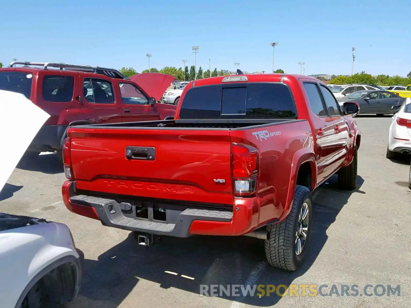 4 Photograph of a damaged car 3TMAZ5CN3KM080215 TOYOTA TACOMA DOU 2019