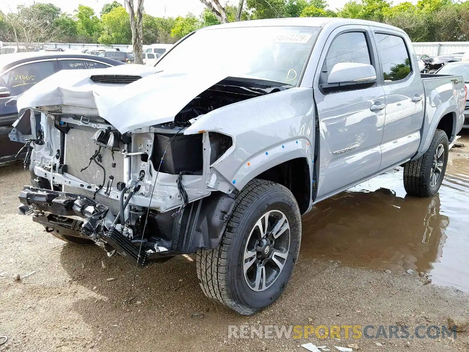 2 Photograph of a damaged car 3TMAZ5CN3KM096589 TOYOTA TACOMA DOU 2019