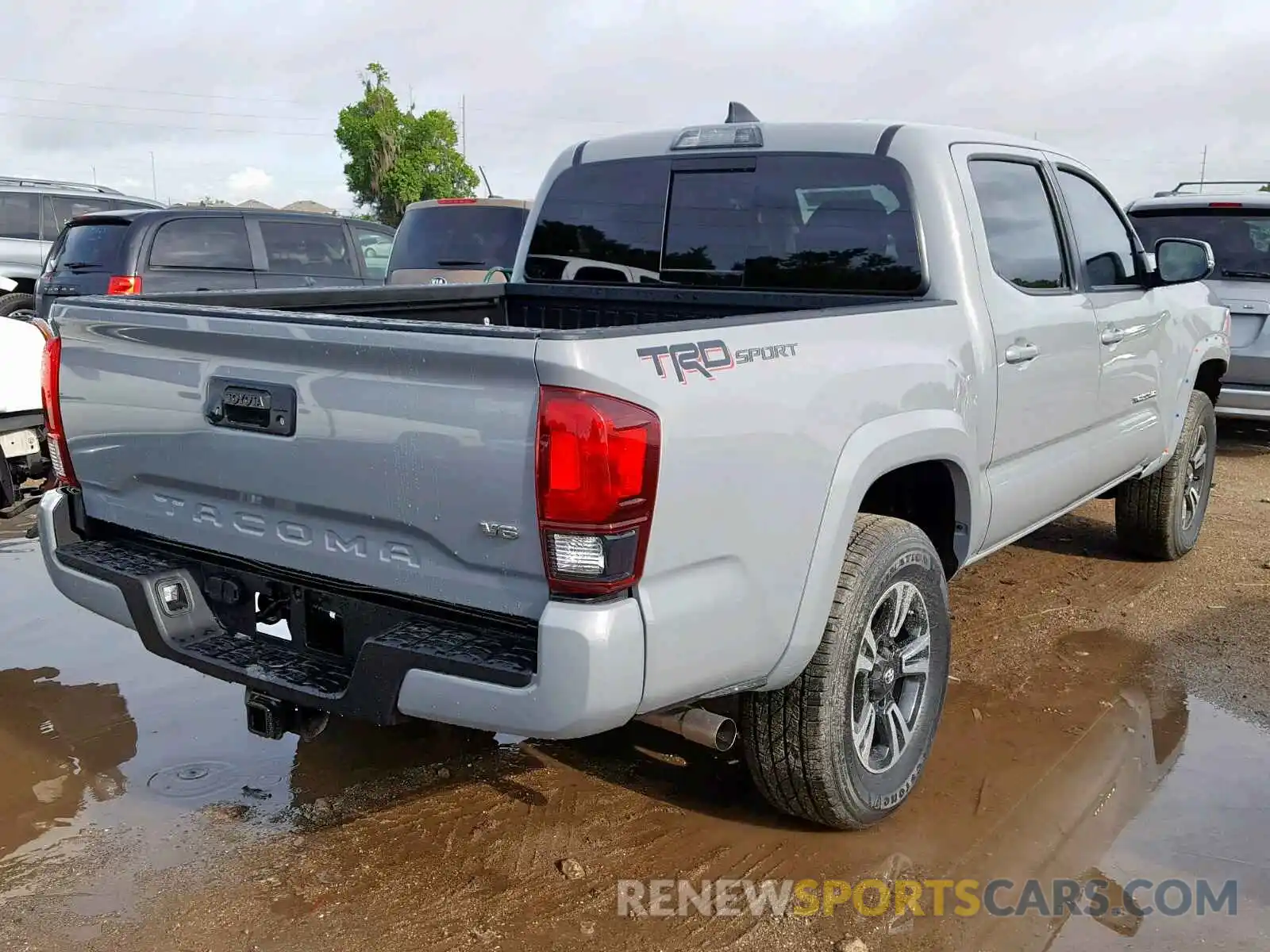 4 Photograph of a damaged car 3TMAZ5CN3KM096589 TOYOTA TACOMA DOU 2019