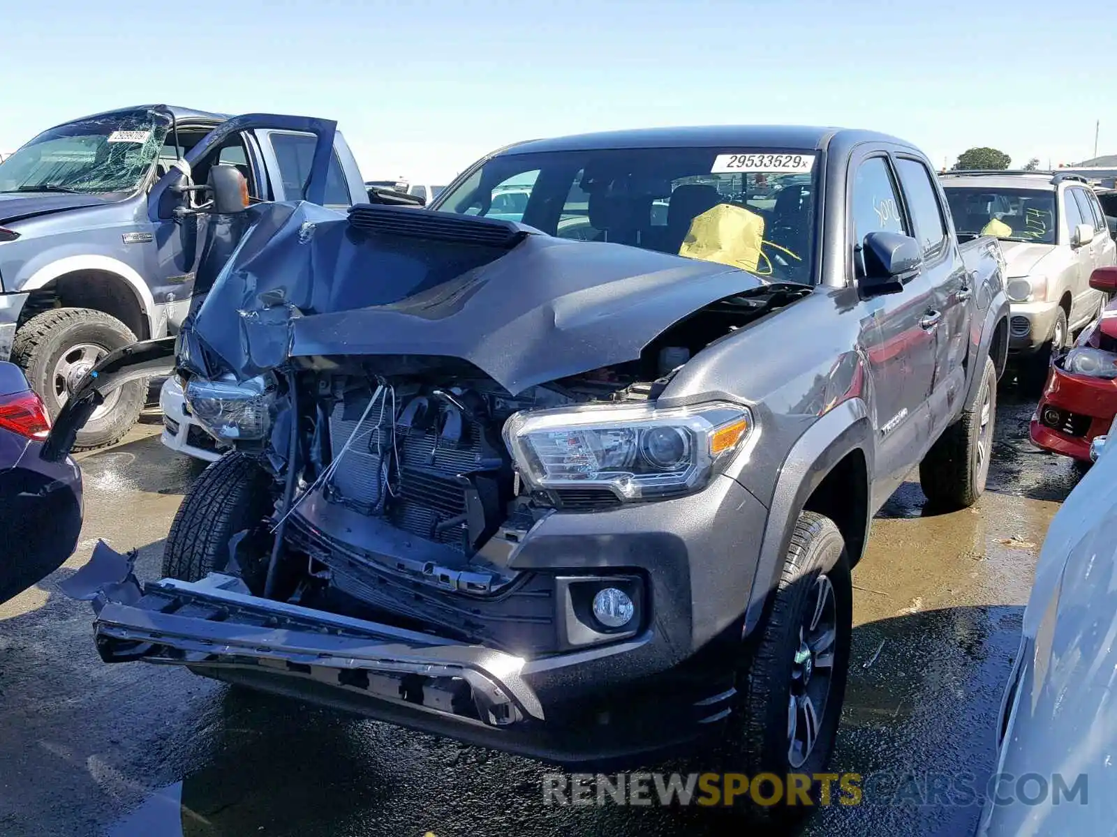 2 Photograph of a damaged car 3TMAZ5CN4KM085049 TOYOTA TACOMA DOU 2019