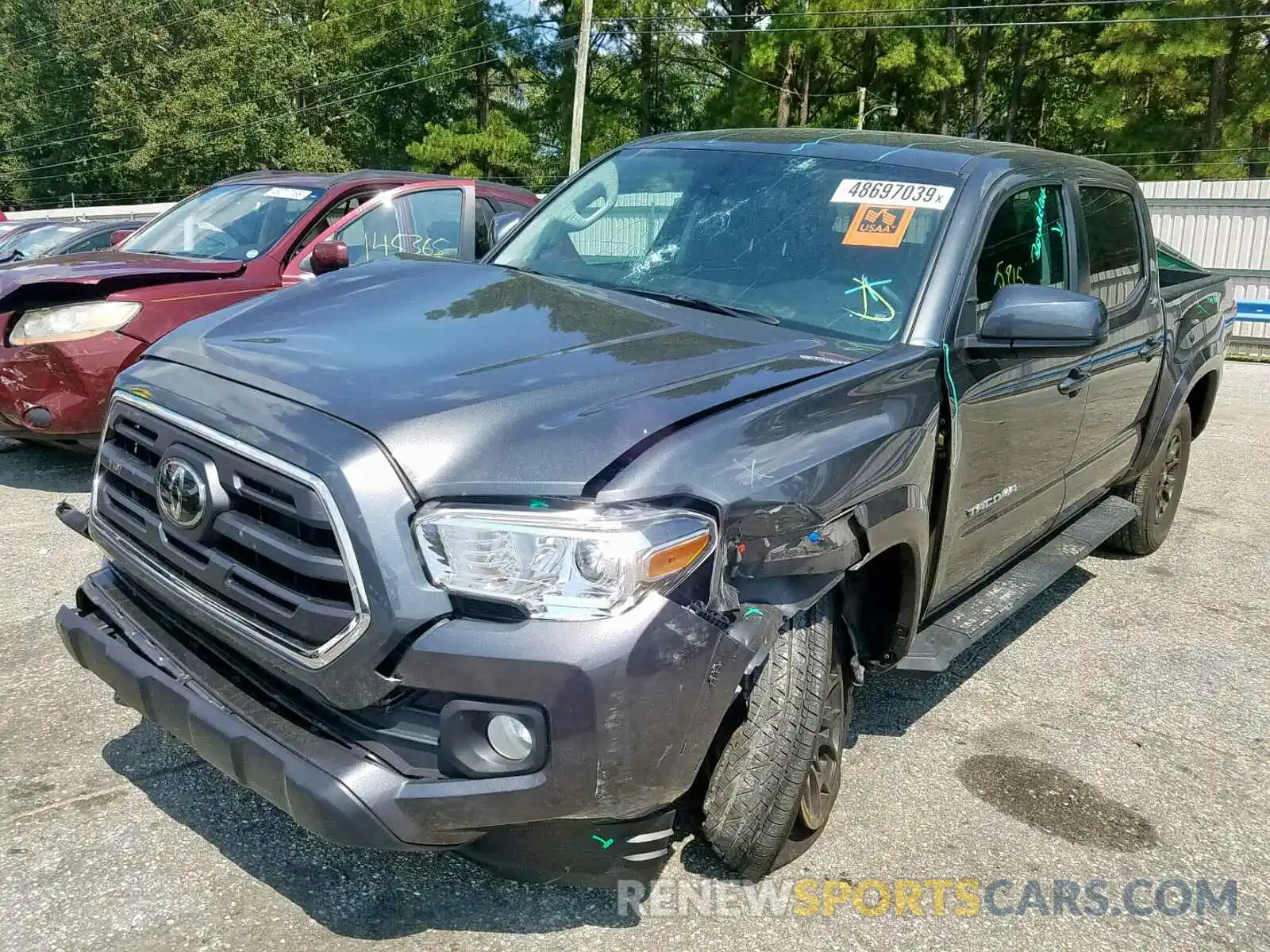 2 Photograph of a damaged car 3TMAZ5CN4KM089389 TOYOTA TACOMA DOU 2019