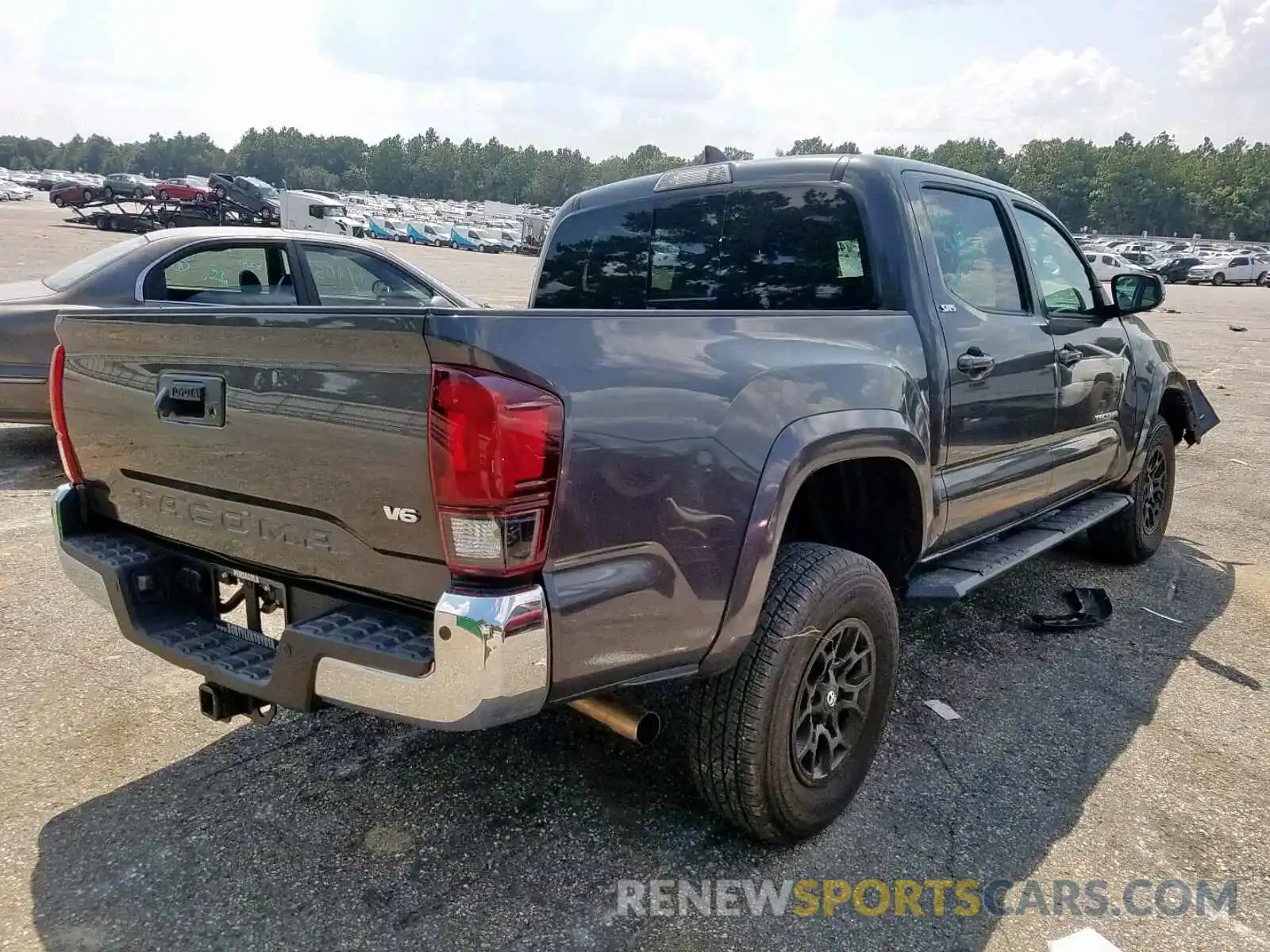 4 Photograph of a damaged car 3TMAZ5CN4KM089389 TOYOTA TACOMA DOU 2019