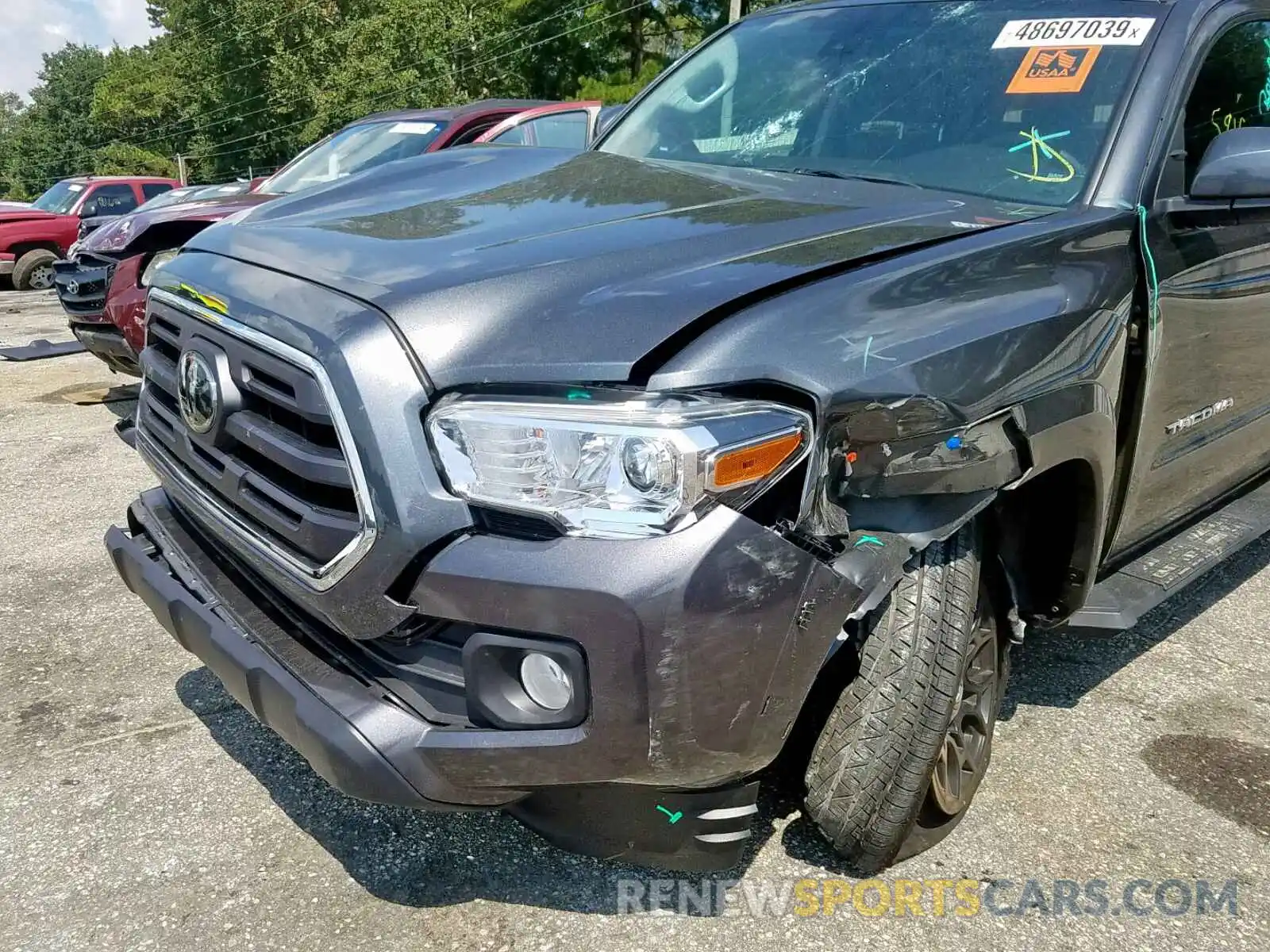 9 Photograph of a damaged car 3TMAZ5CN4KM089389 TOYOTA TACOMA DOU 2019