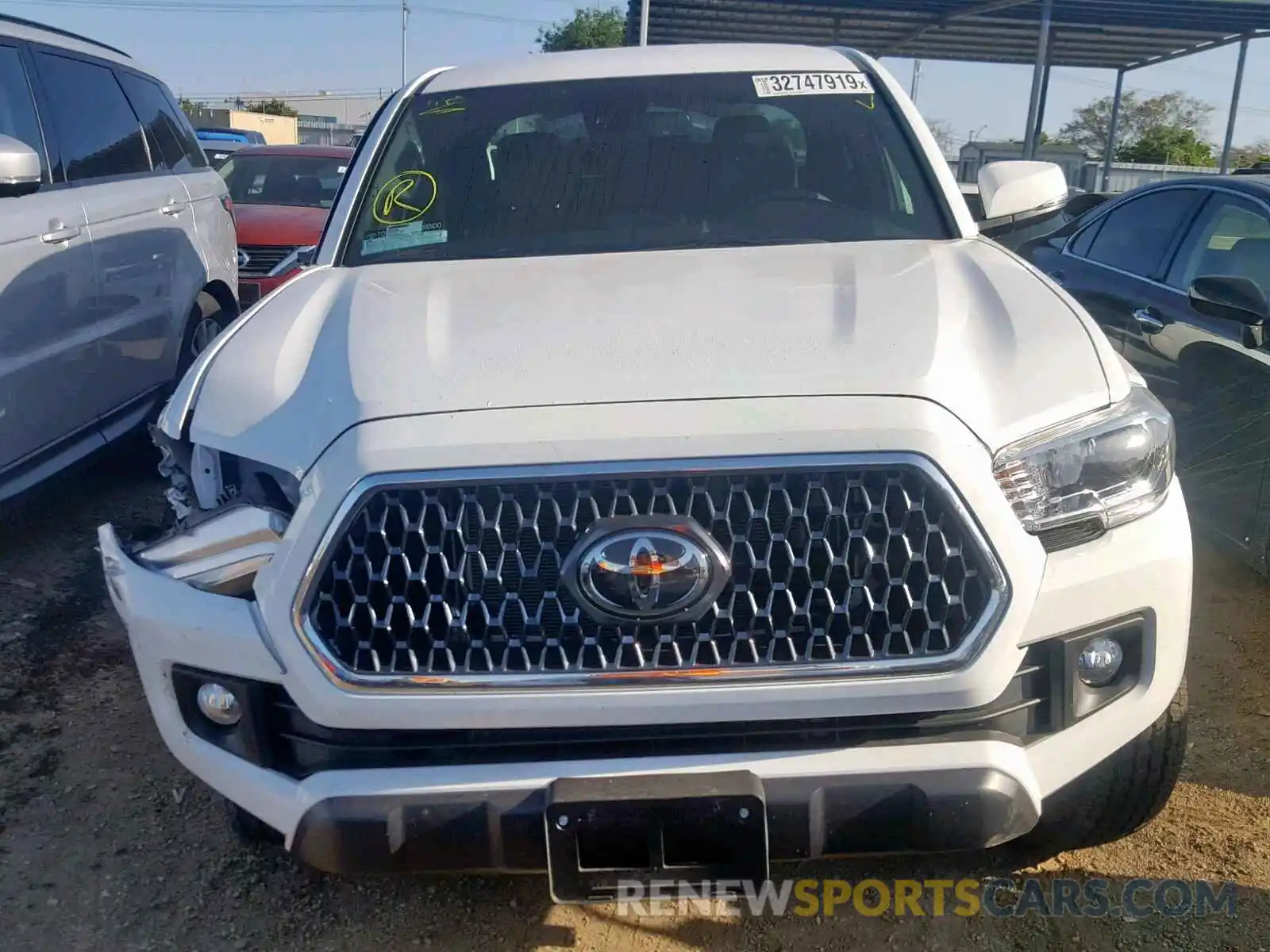 9 Photograph of a damaged car 3TMAZ5CN4KM089618 TOYOTA TACOMA DOU 2019