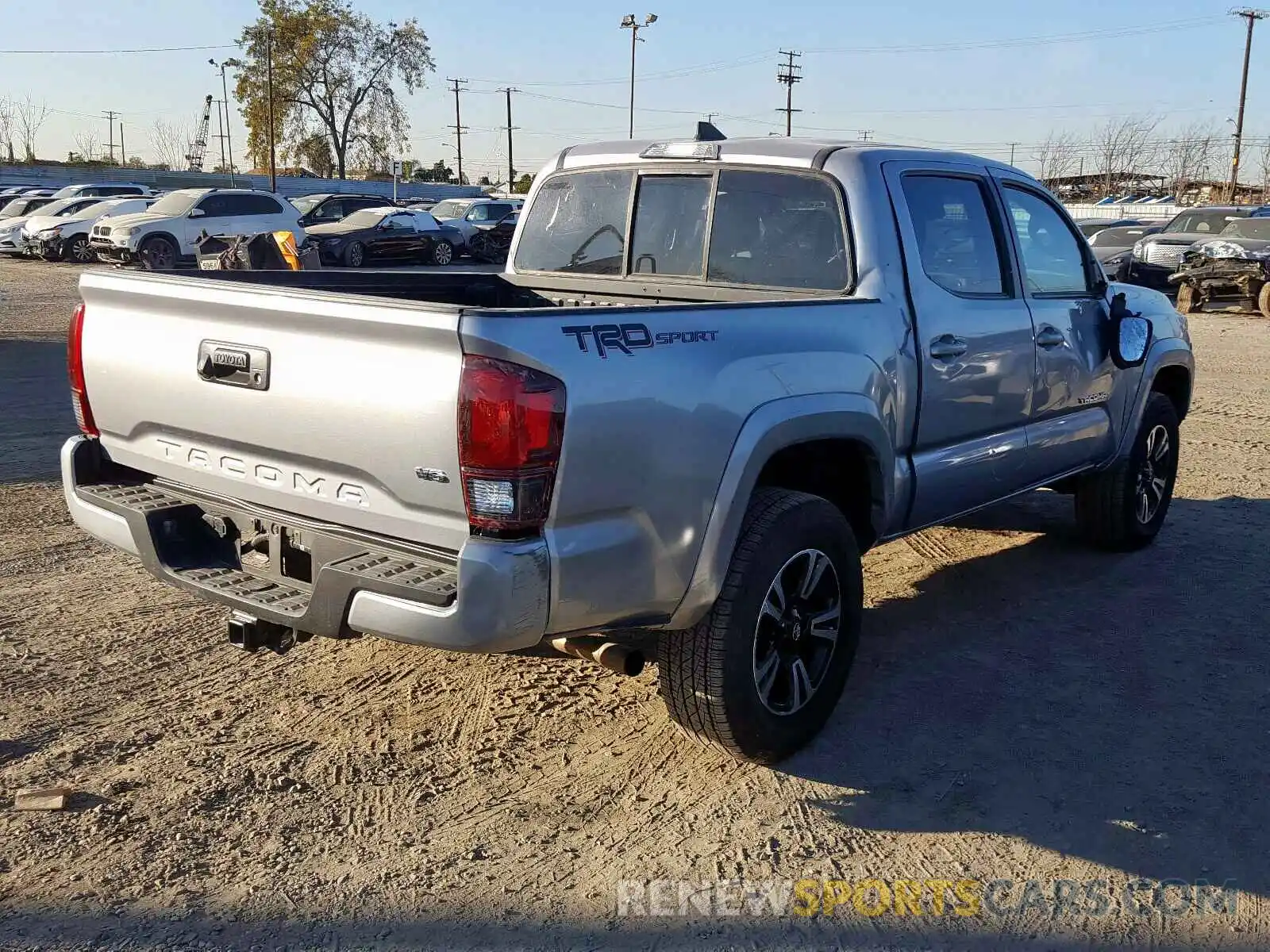 4 Photograph of a damaged car 3TMAZ5CN6KM096425 TOYOTA TACOMA DOU 2019