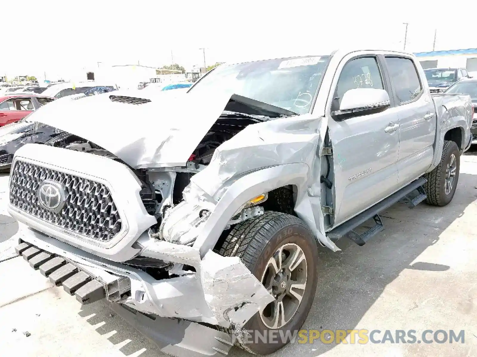 2 Photograph of a damaged car 3TMAZ5CN7KM082128 TOYOTA TACOMA DOU 2019