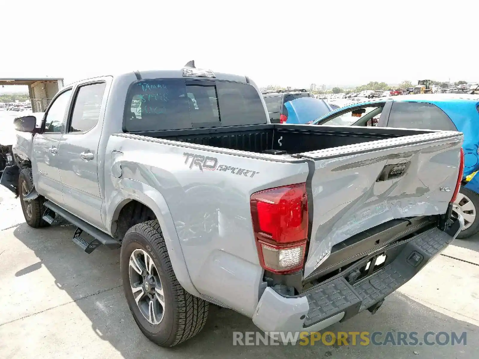 3 Photograph of a damaged car 3TMAZ5CN7KM082128 TOYOTA TACOMA DOU 2019