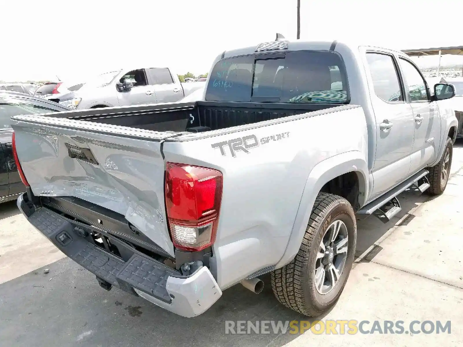 4 Photograph of a damaged car 3TMAZ5CN7KM082128 TOYOTA TACOMA DOU 2019