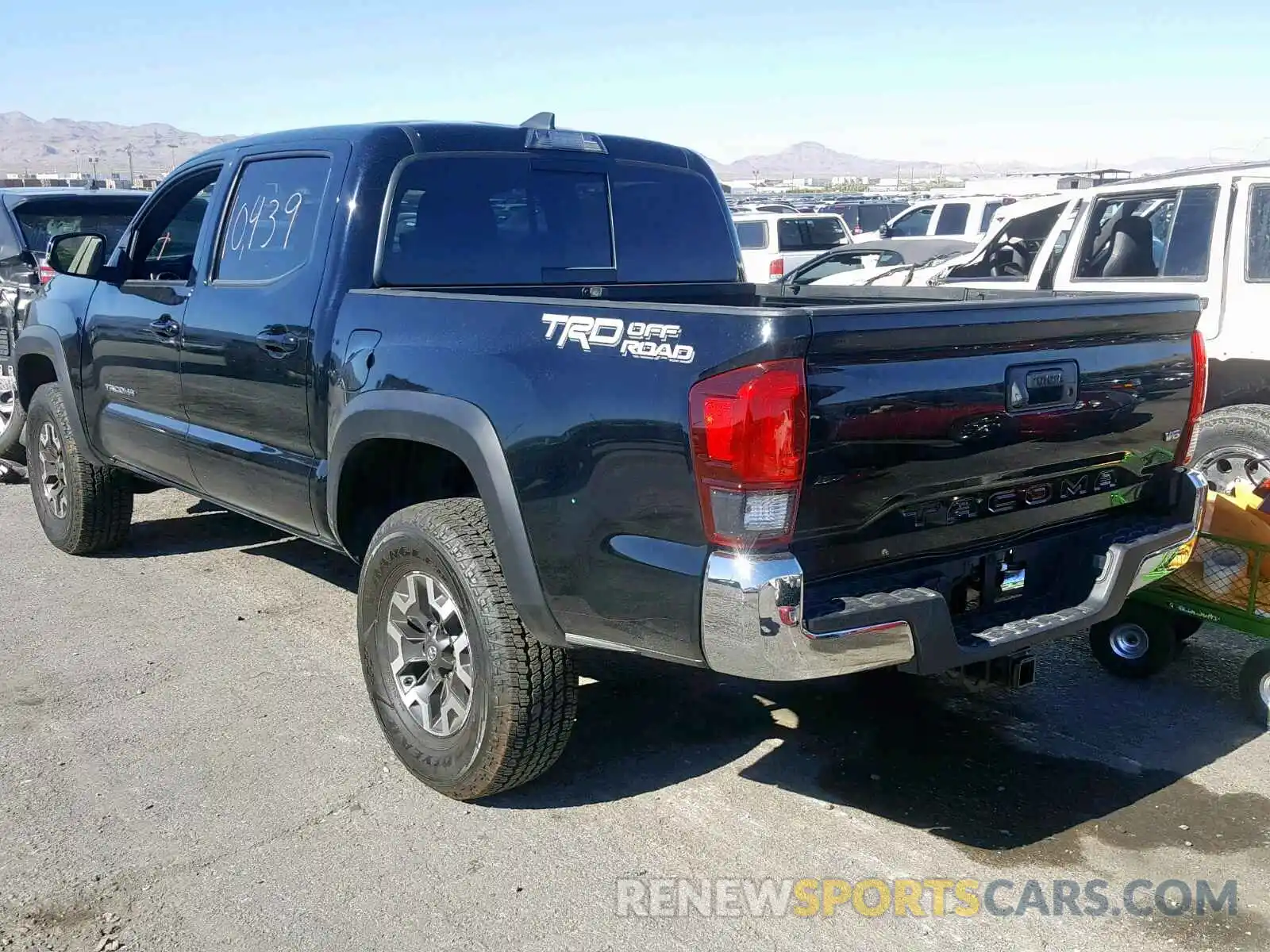 3 Photograph of a damaged car 3TMAZ5CN7KM089869 TOYOTA TACOMA DOU 2019