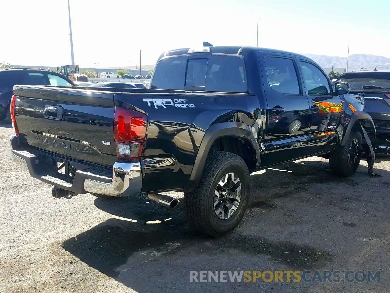 4 Photograph of a damaged car 3TMAZ5CN7KM089869 TOYOTA TACOMA DOU 2019