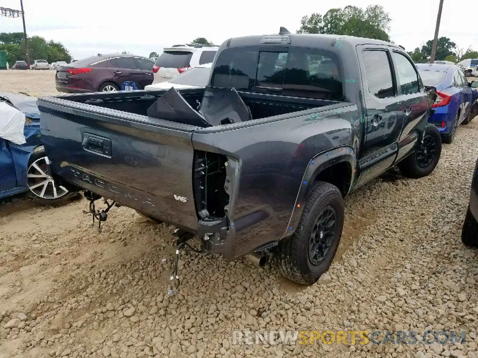 4 Photograph of a damaged car 3TMAZ5CN8KM094529 TOYOTA TACOMA DOU 2019