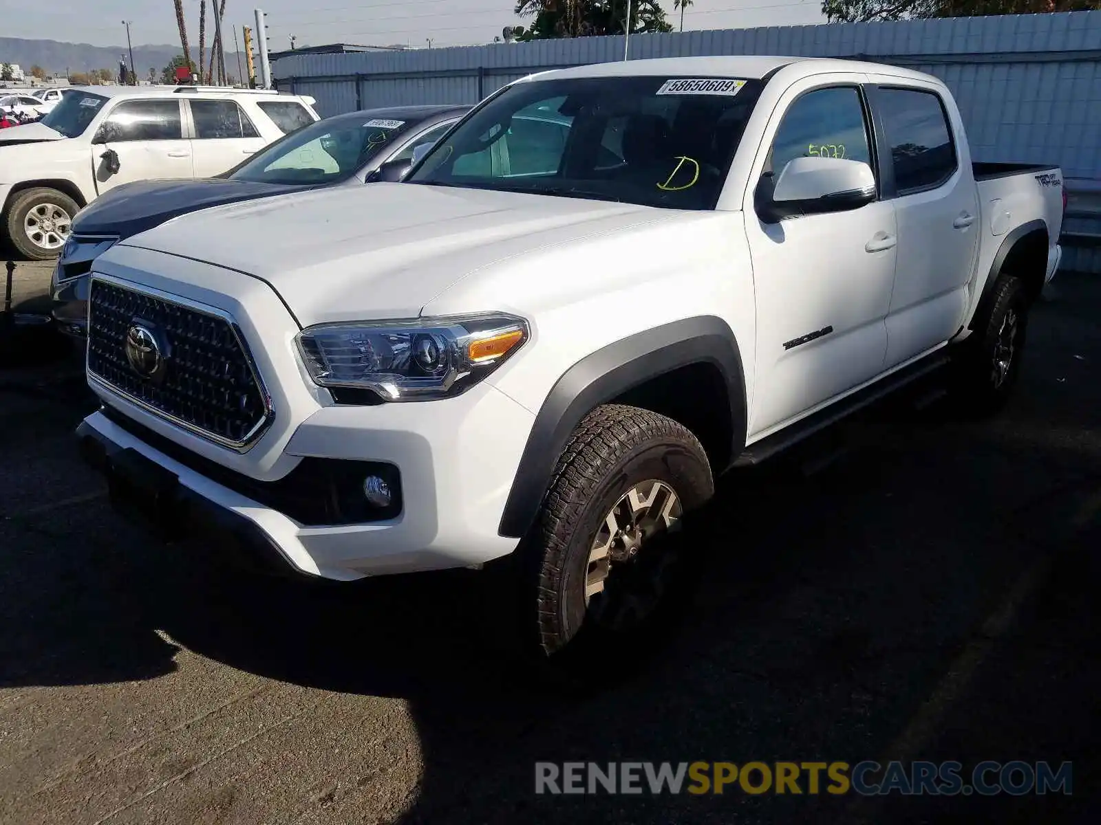 2 Photograph of a damaged car 3TMAZ5CN8KM100152 TOYOTA TACOMA DOU 2019