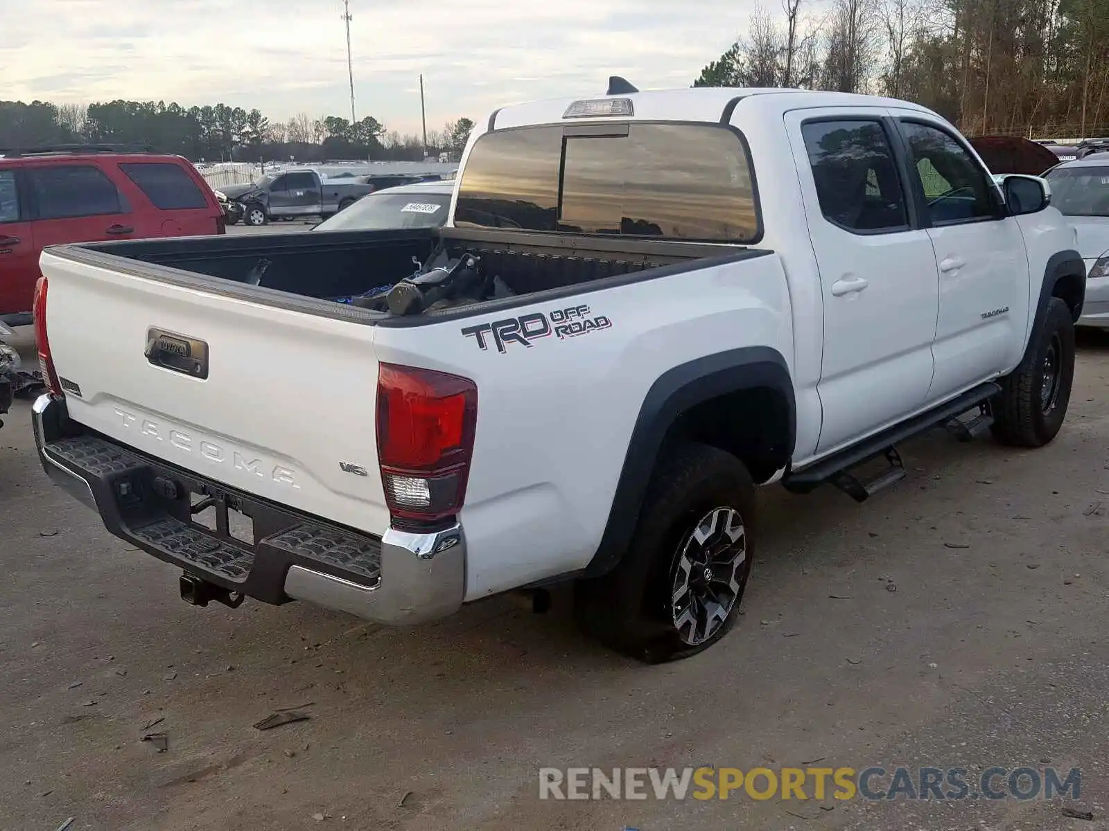 4 Photograph of a damaged car 3TMAZ5CN9KM092420 TOYOTA TACOMA DOU 2019