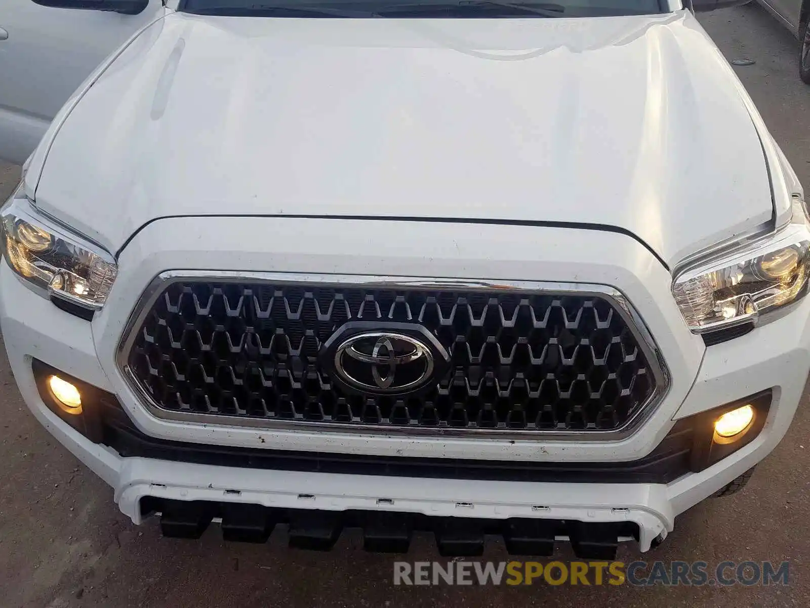 7 Photograph of a damaged car 3TMAZ5CN9KM092420 TOYOTA TACOMA DOU 2019