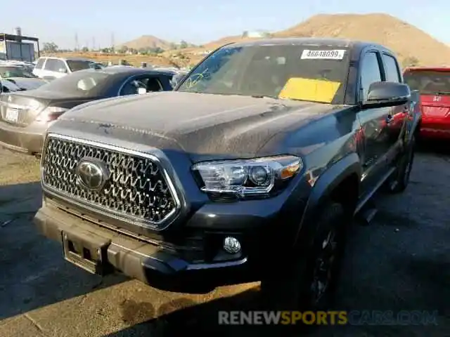 2 Photograph of a damaged car 3TMAZ5CNXKM086884 TOYOTA TACOMA DOU 2019